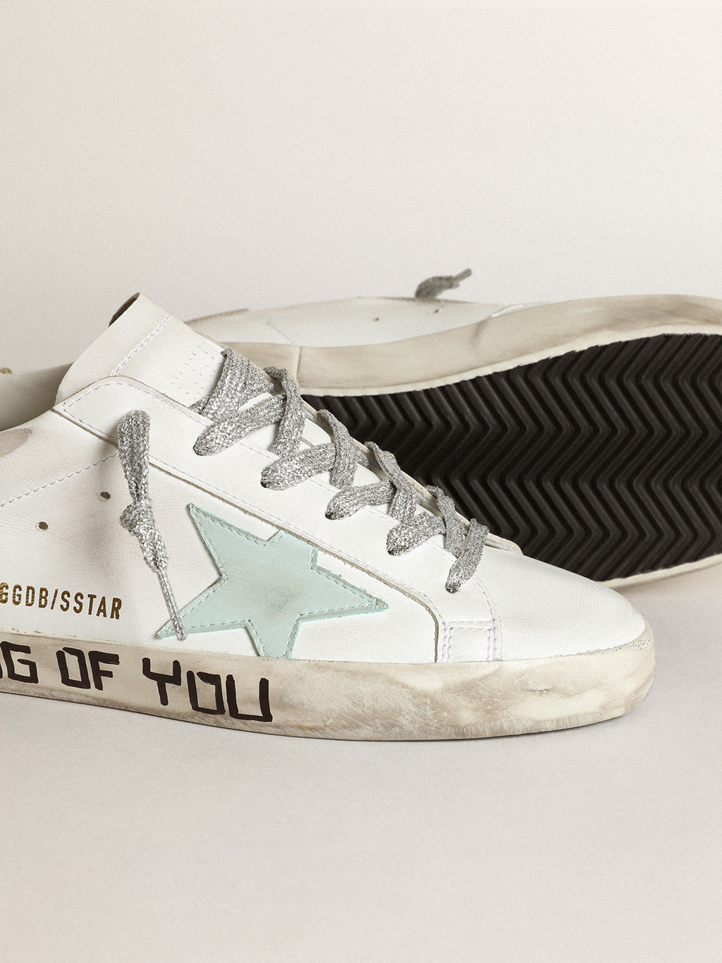 Super-Star LTD with an aquamarine star and platinum heel tab| Golden Goose