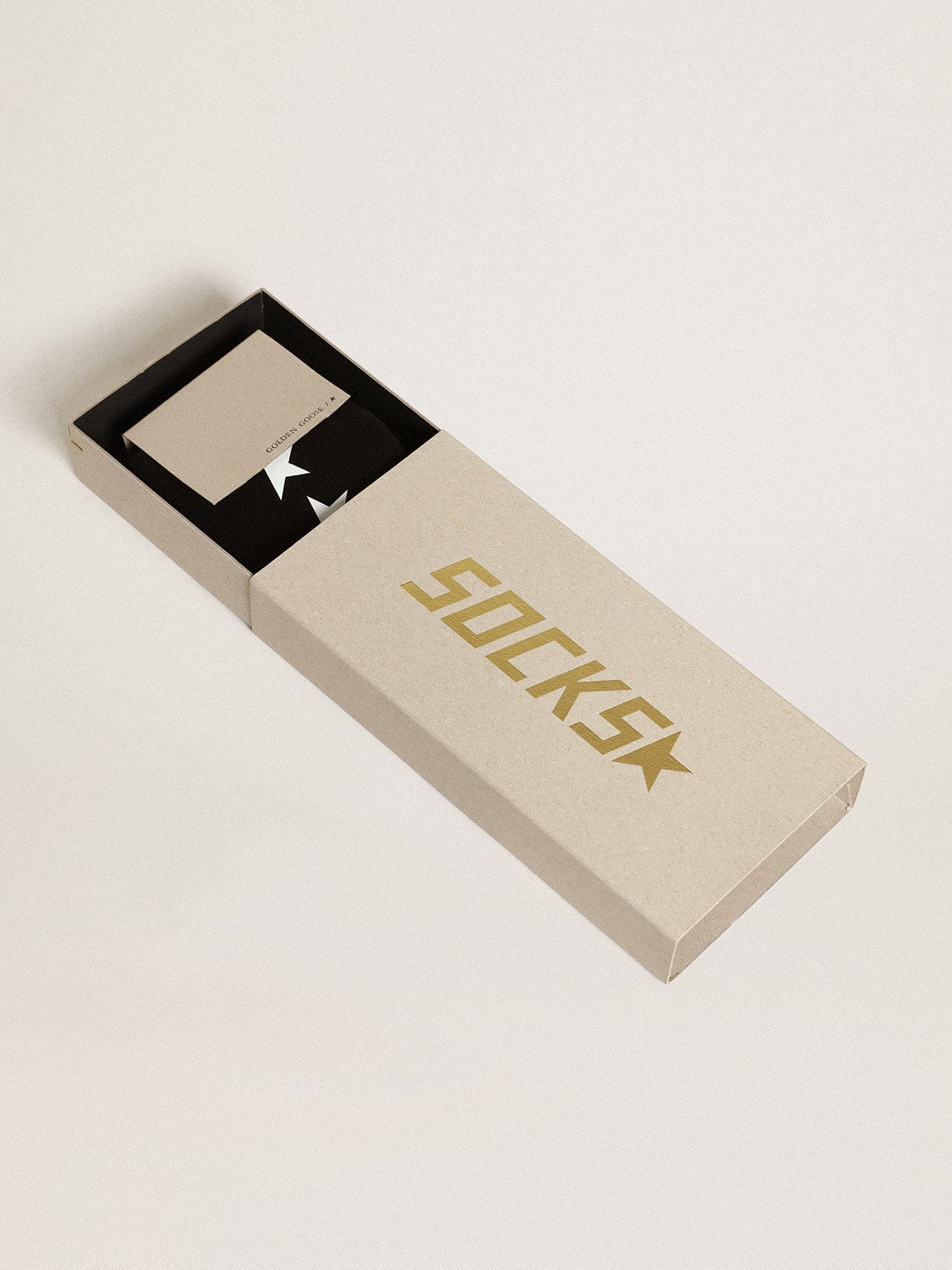 Black socks with contrasting white stars| Golden Goose