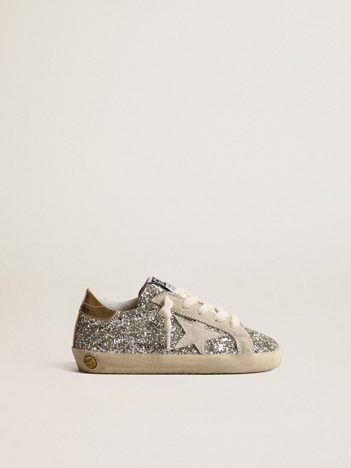 Super-Star Junior in glitter with a suede star and gold heel tab| Golden Goose