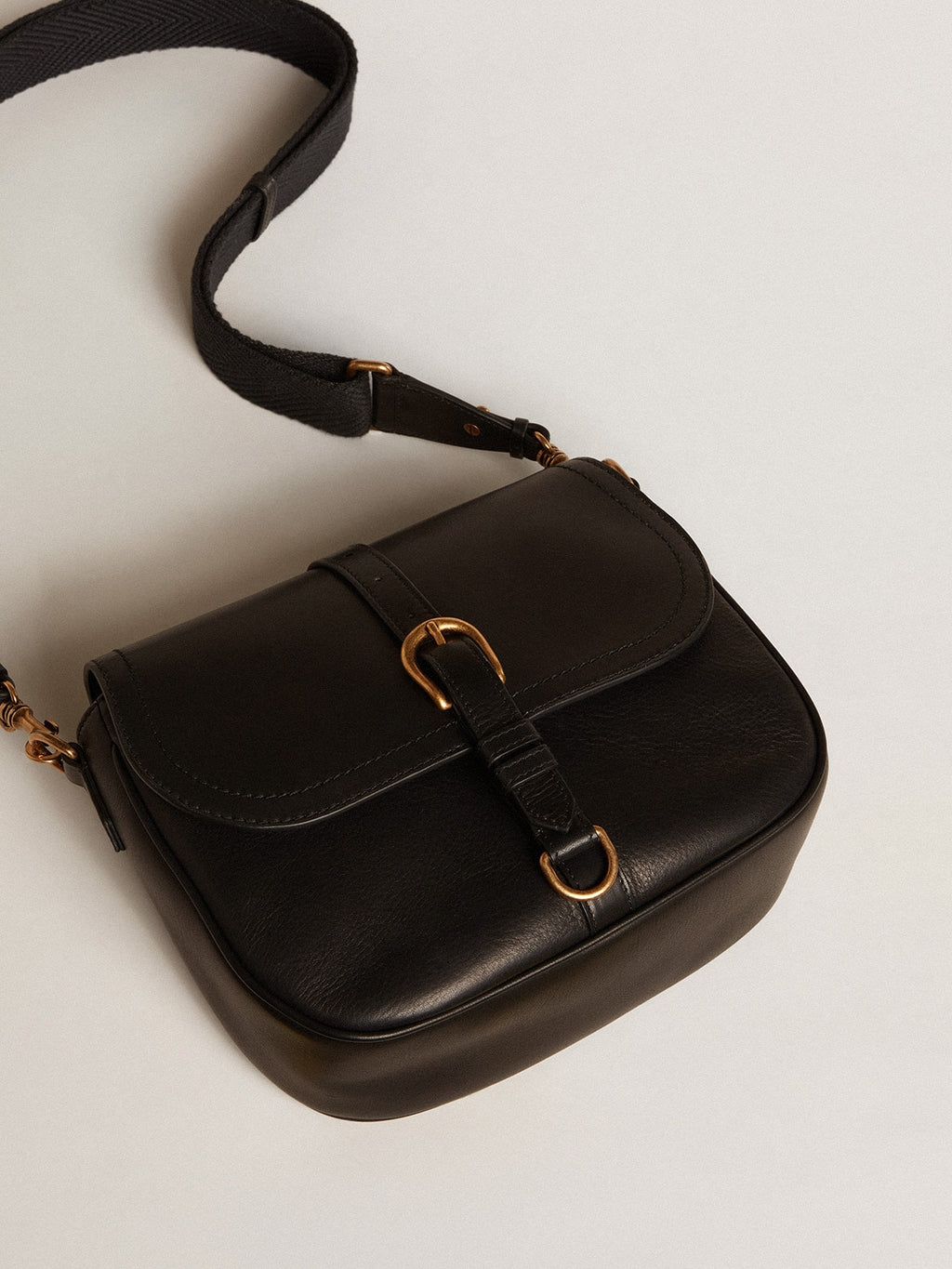Medium Sally Bag in black leather with buckle and shoulder strap| Golden Goose