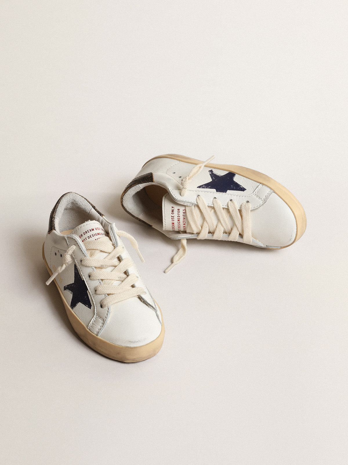 Super-Star Young in nappa with a printed star and black heel tab| Golden Goose