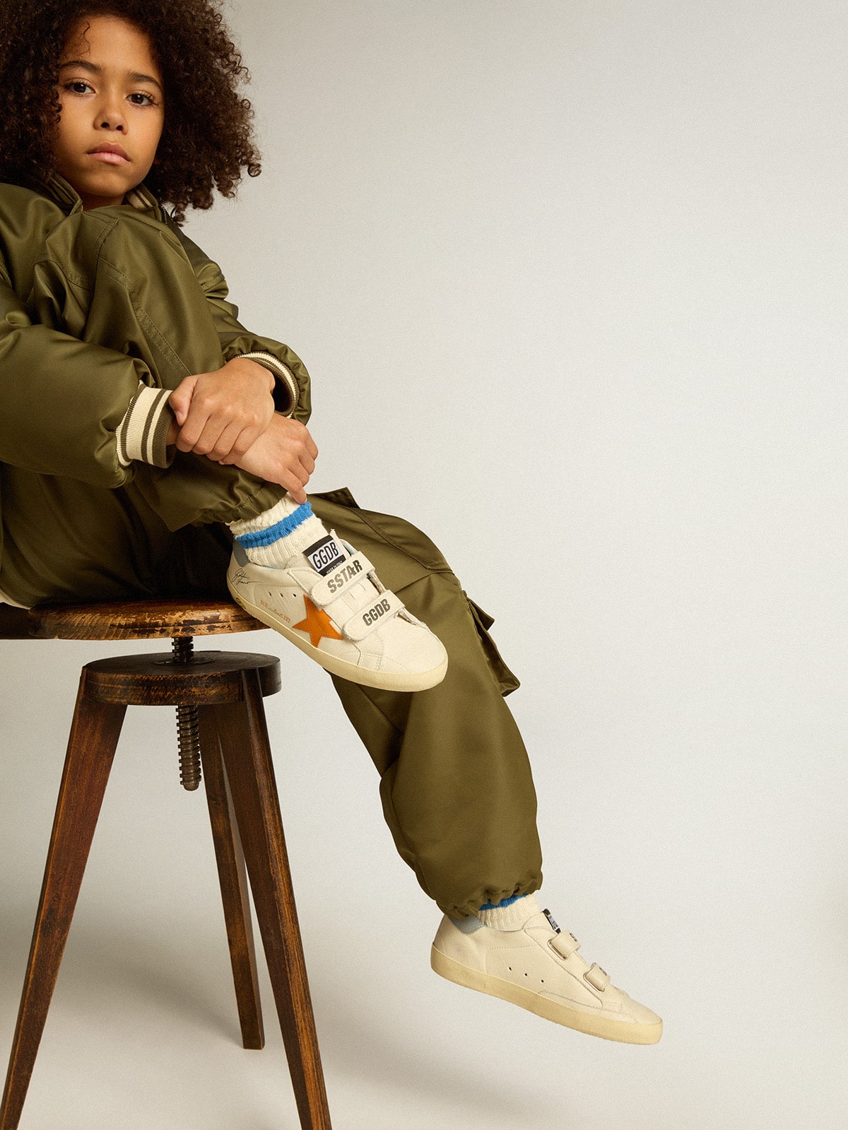 Junior Old School in leather with orange star and baby blue heel tab| Golden Goose