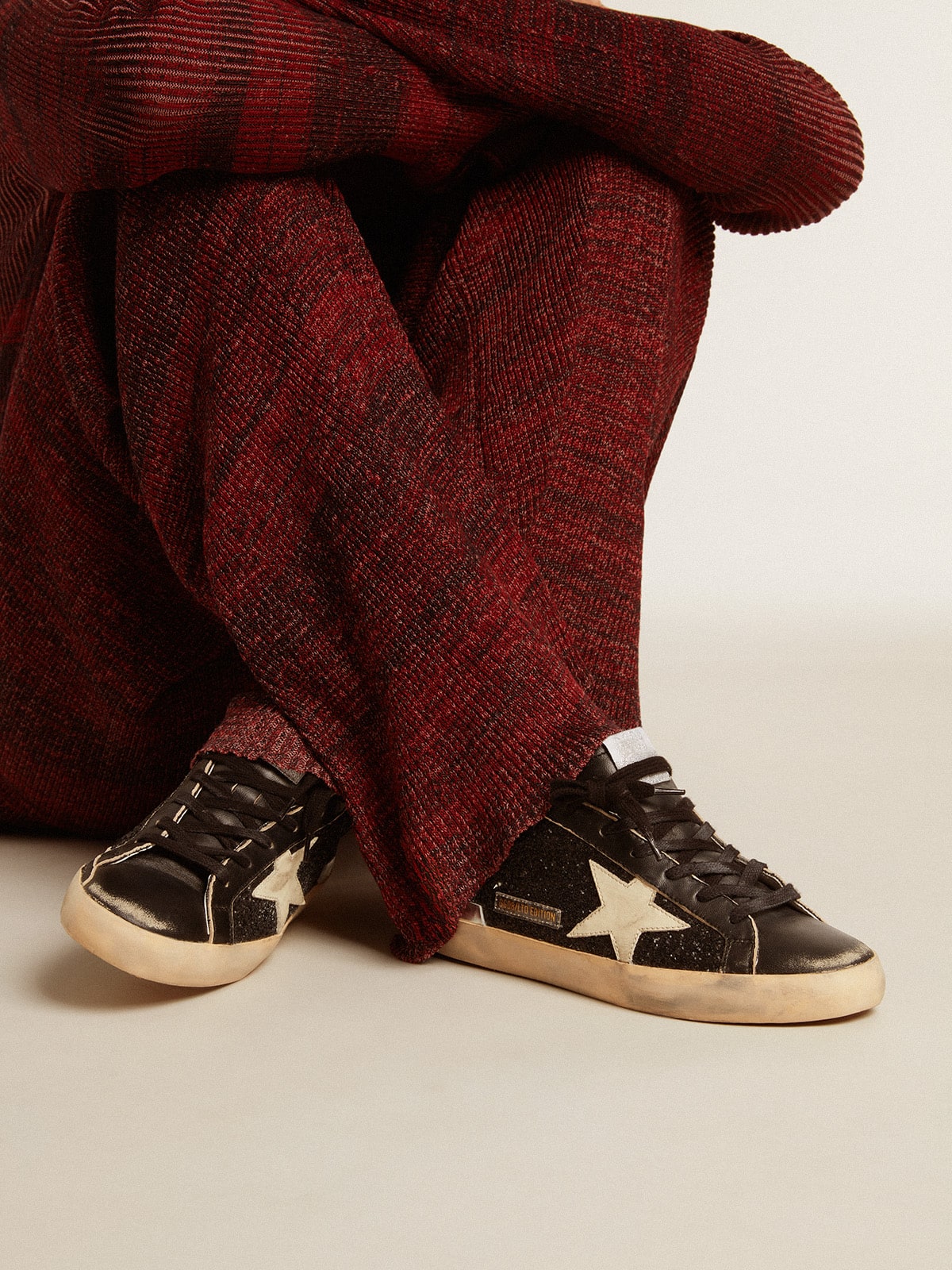 Super-Star in black glitter and nappa with cream leather star and heel tab| Golden Goose