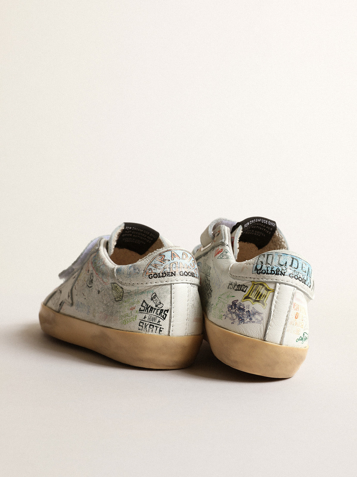 Old School Young in white nappa with multicolored graffiti print| Golden Goose
