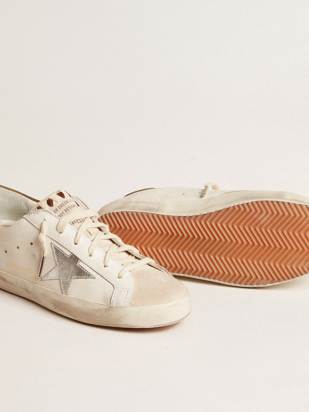 Super-Star LTD with metallic silver leather star and brown heel tab| Golden Goose