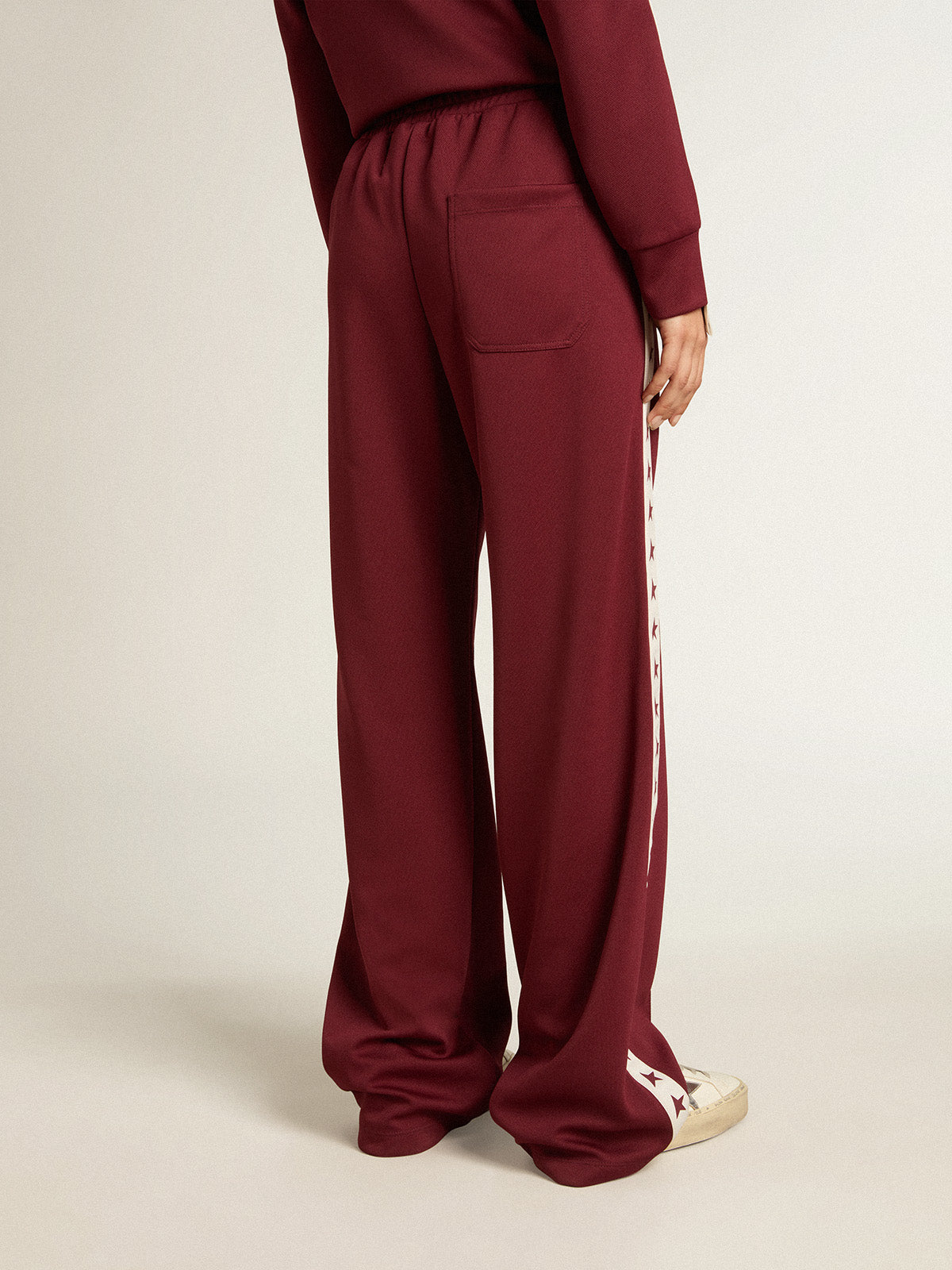 Women's burgundy joggers with stars on the sides| Golden Goose