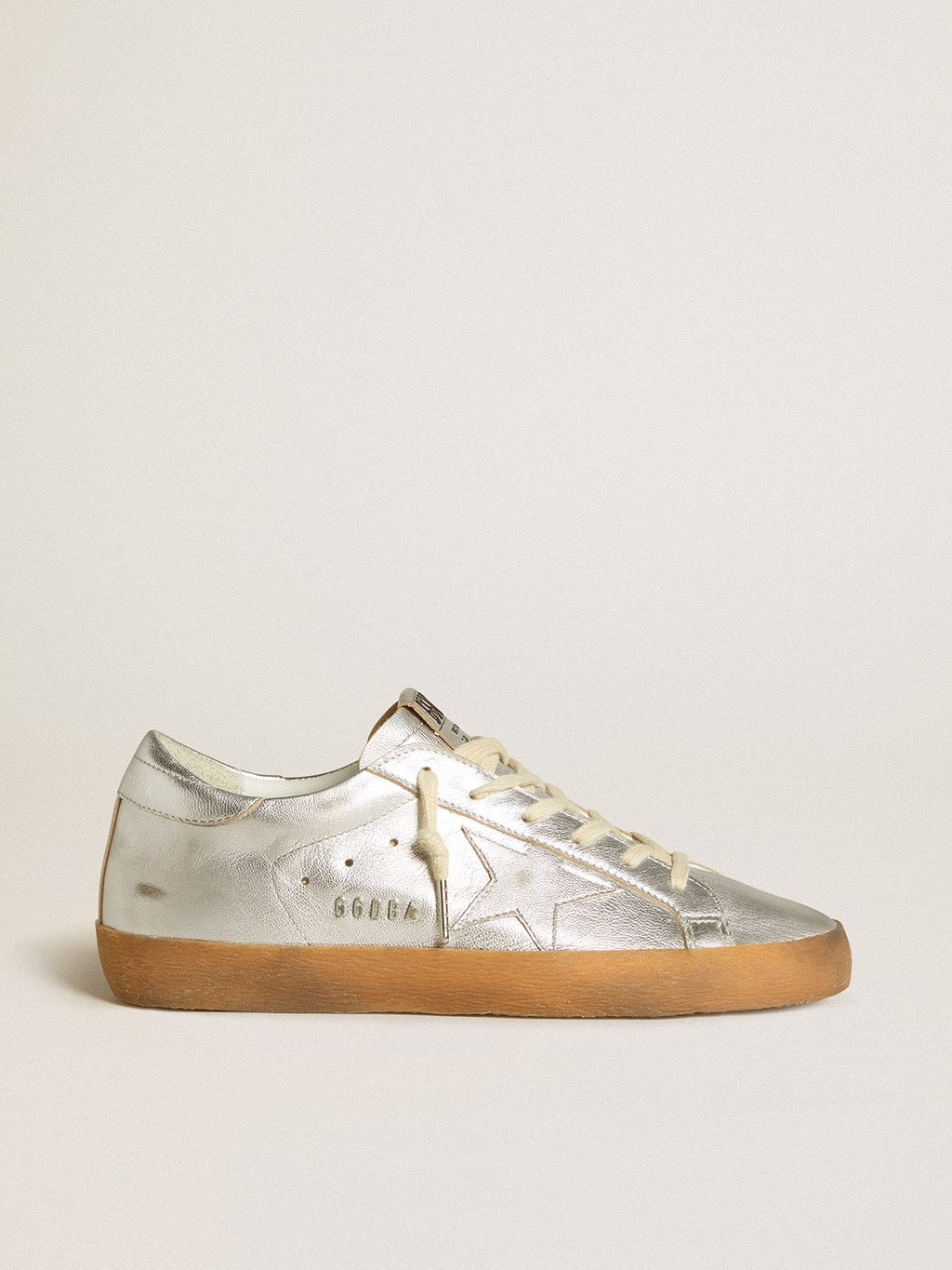 Super-Star in silver metallic leather with leather star and heel tab| Golden Goose