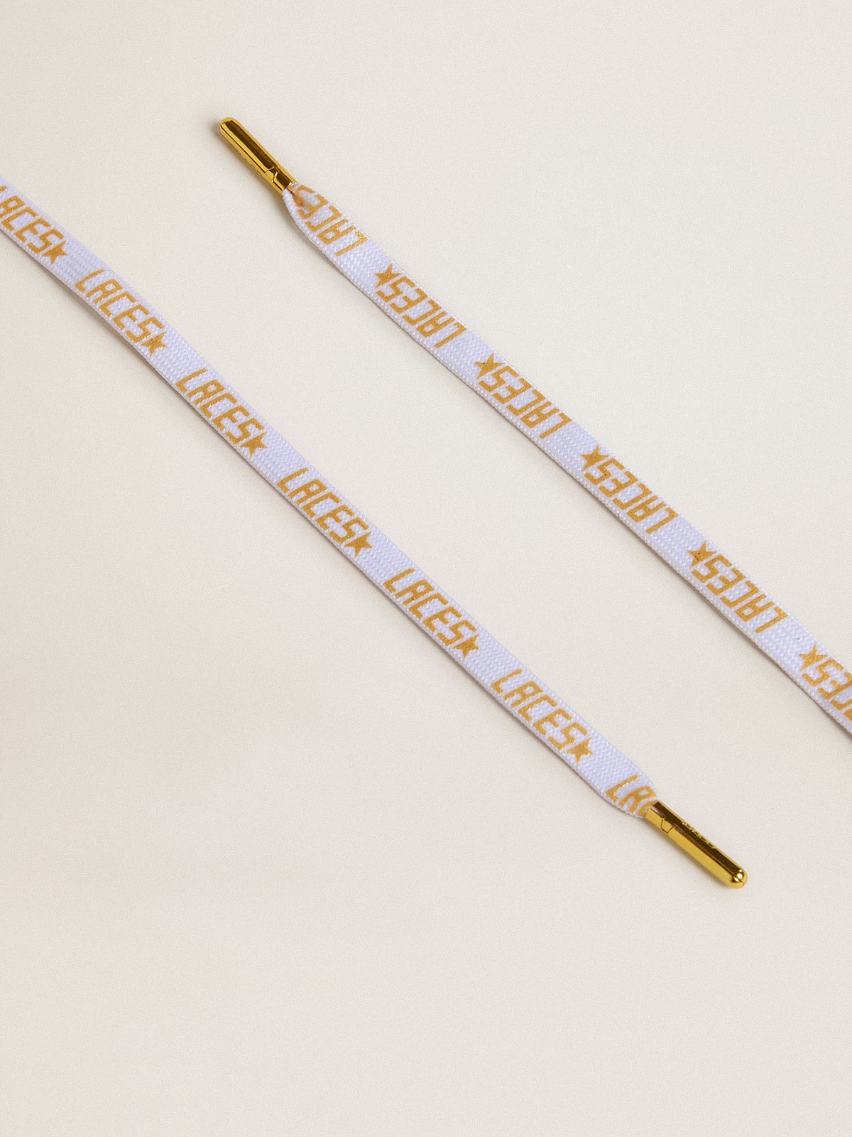 White laces with contrasting gold-colored 'Laces' lettering| Golden Goose
