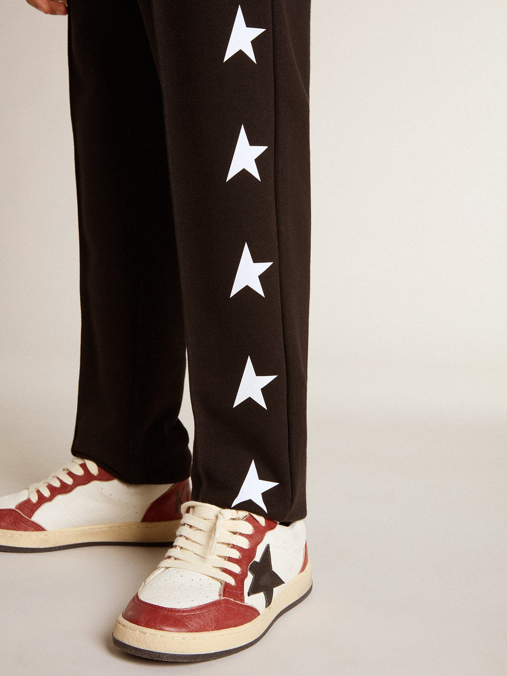 Boys' black joggers with white stars| Golden Goose