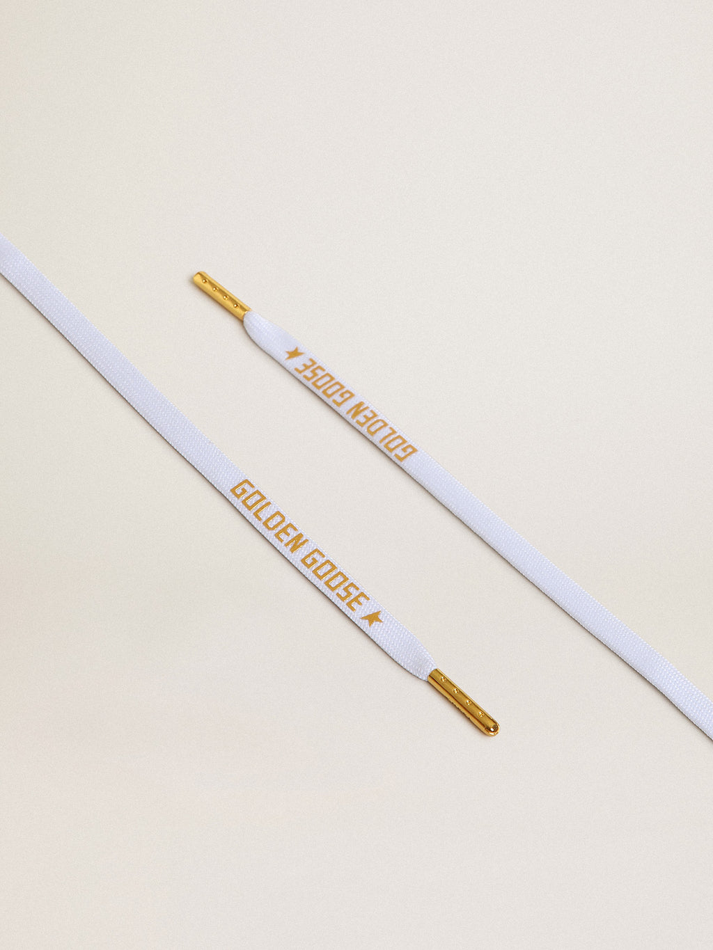 White cotton laces with contrasting gold-colored logo| Golden Goose