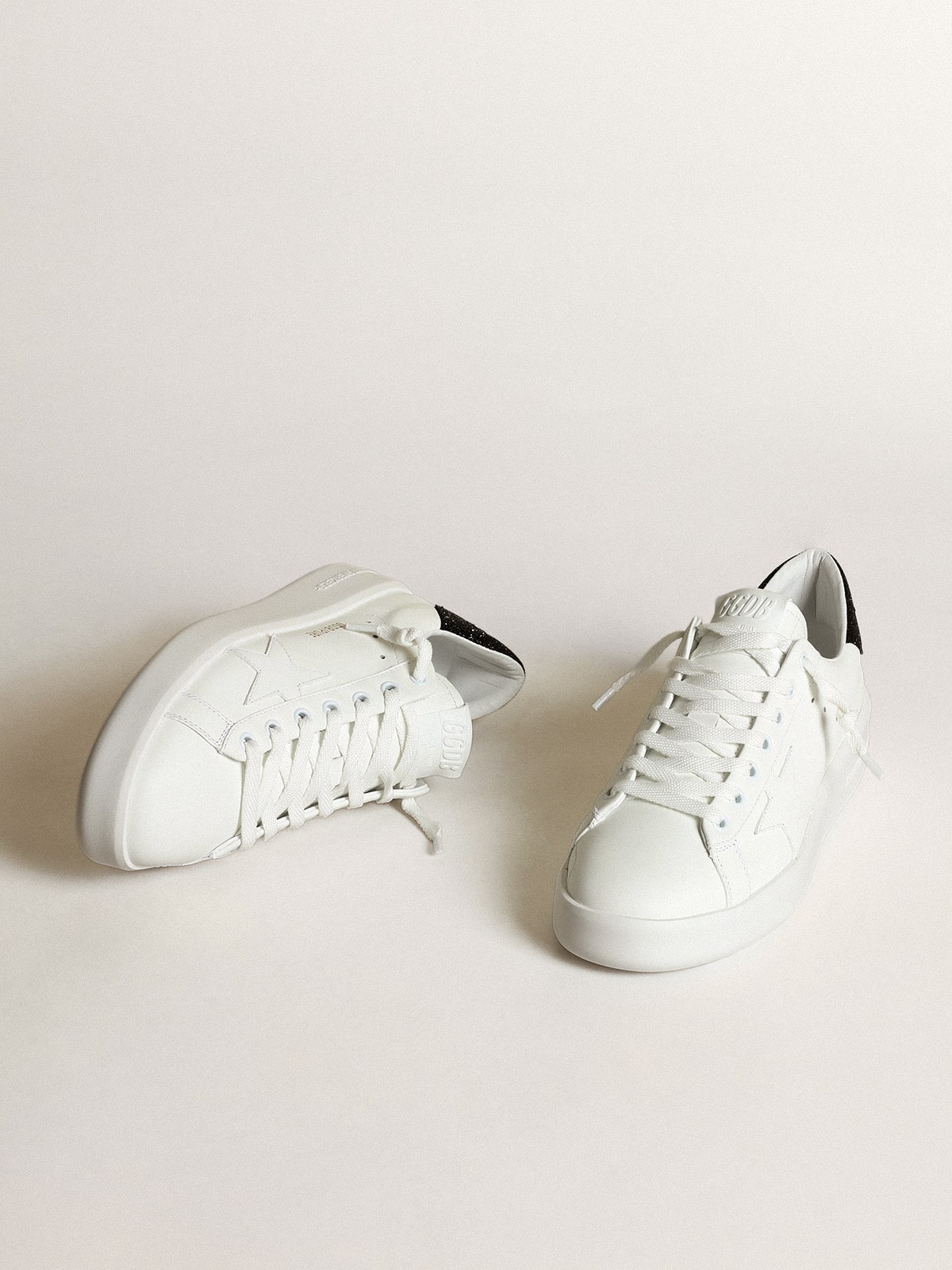 Purestar in white leather with tone-on-tone star and heel tab in black Swarovski crystals| Golden Goose
