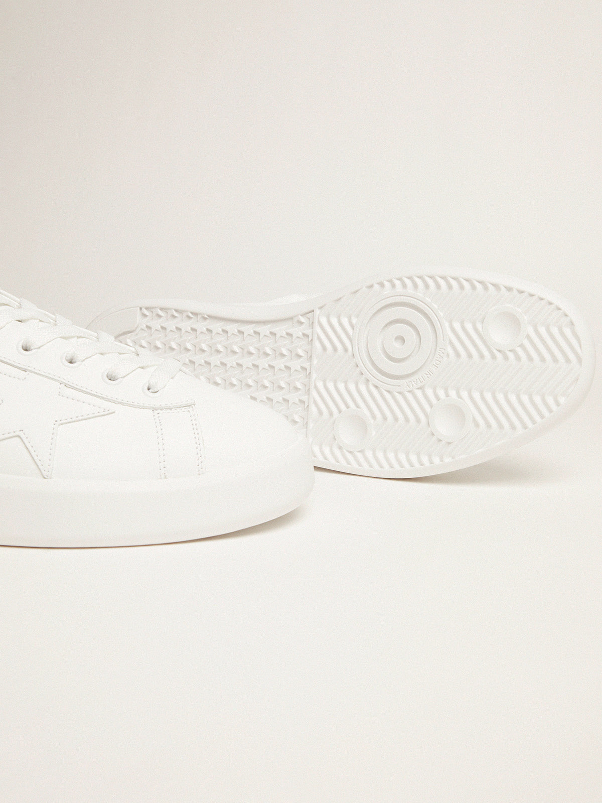 White Purestar sneakers with fluorescent orange heel tab| Golden Goose