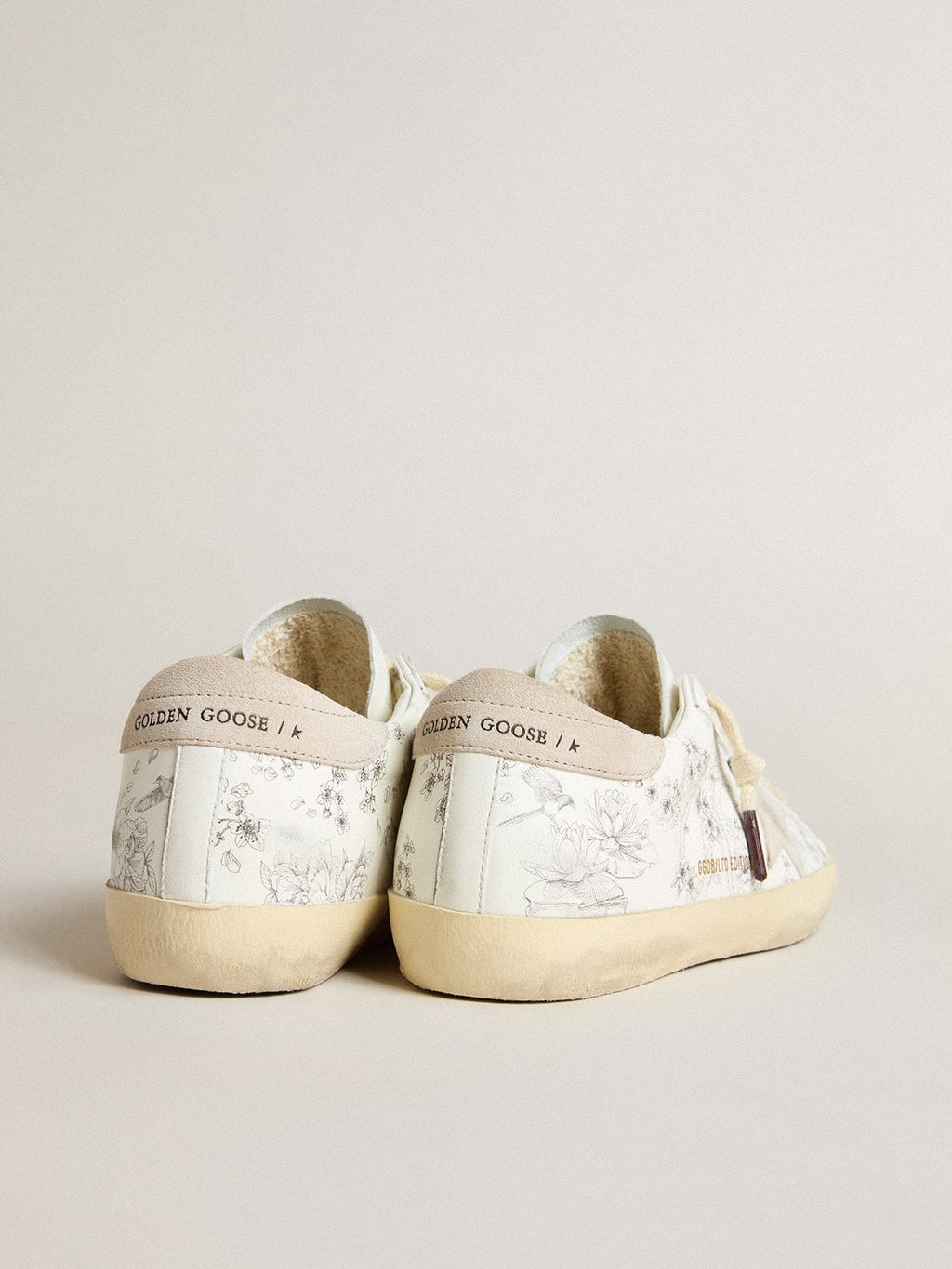 Women's Super-Star LTD CNY in white leather with lettering on the upper