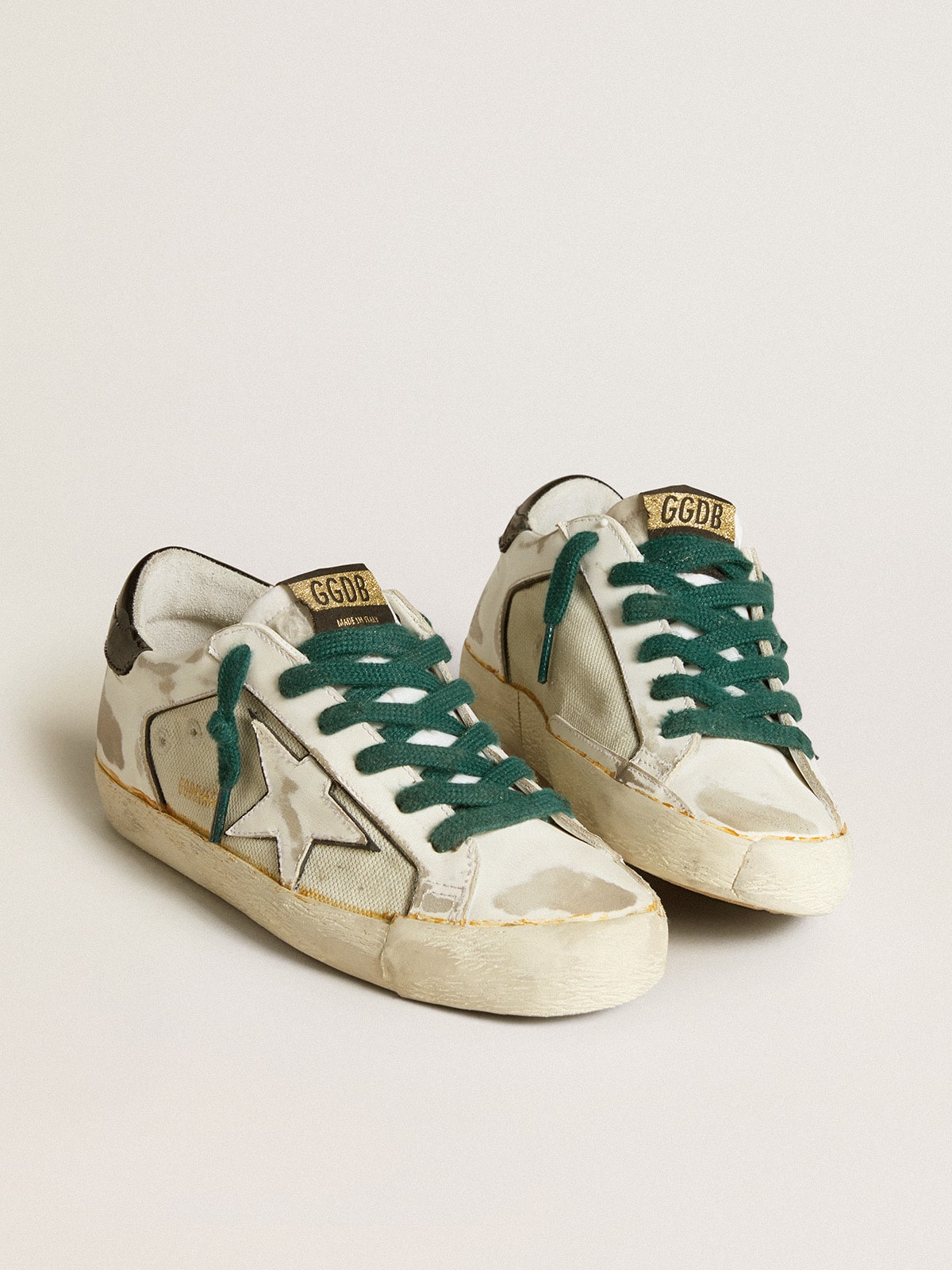 Women's Super-Star LAB in white leather with white star and black heel tab| Golden Goose