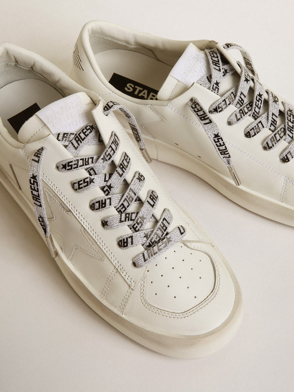 Ice-colored laces with contrasting black 'Laces' lettering| Golden Goose