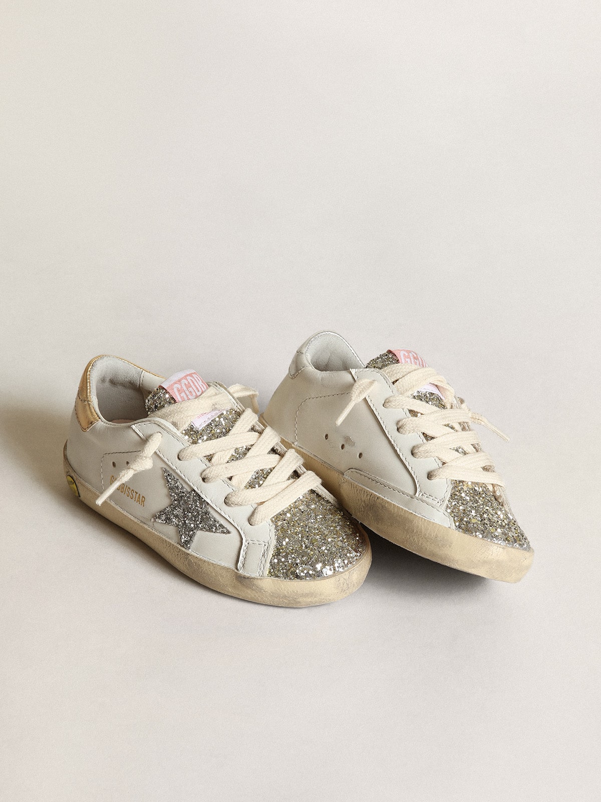 Young Super-Star with silver glitter star and platinum tongue| Golden Goose