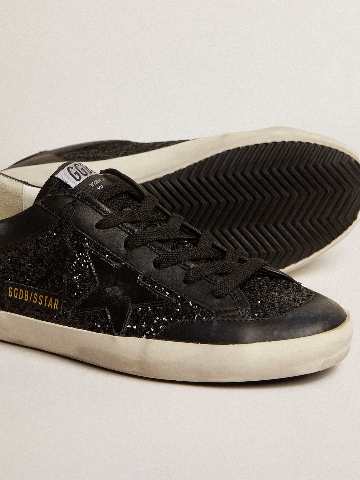 Women's Super-Star in black nappa and glitter with glossy black leather star| Golden Goose