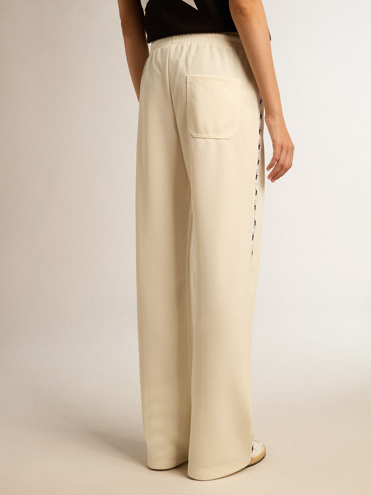 Women's white joggers with stars on the sides| Golden Goose