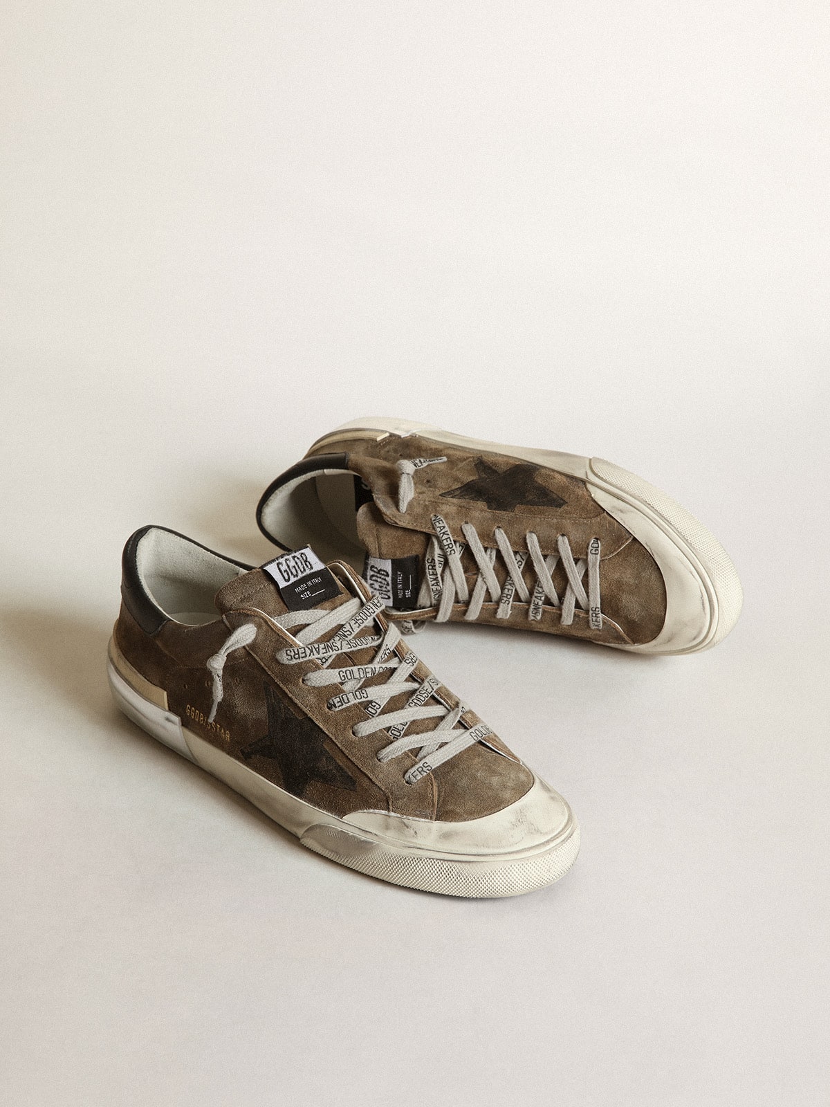 Super-Star LTD in military-green suede with screen-printed star| Golden Goose