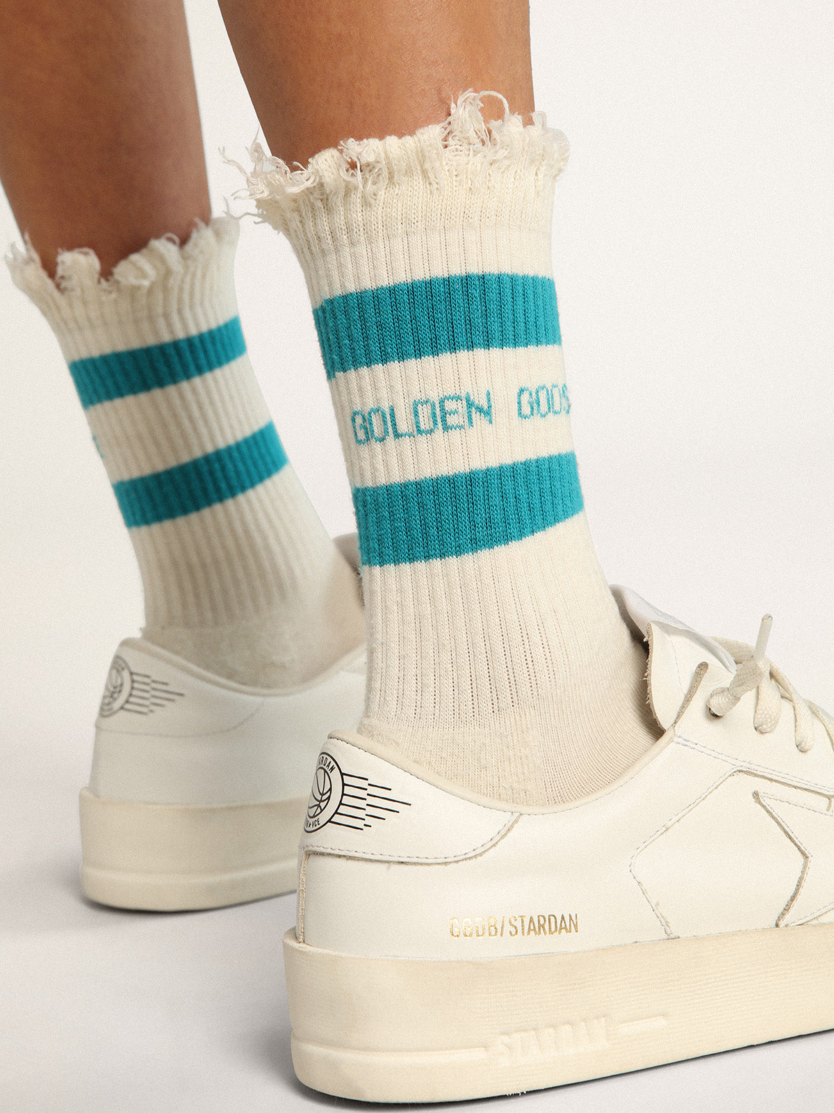 Distressed-finish white socks with turquoise logo and stripes| Golden Goose