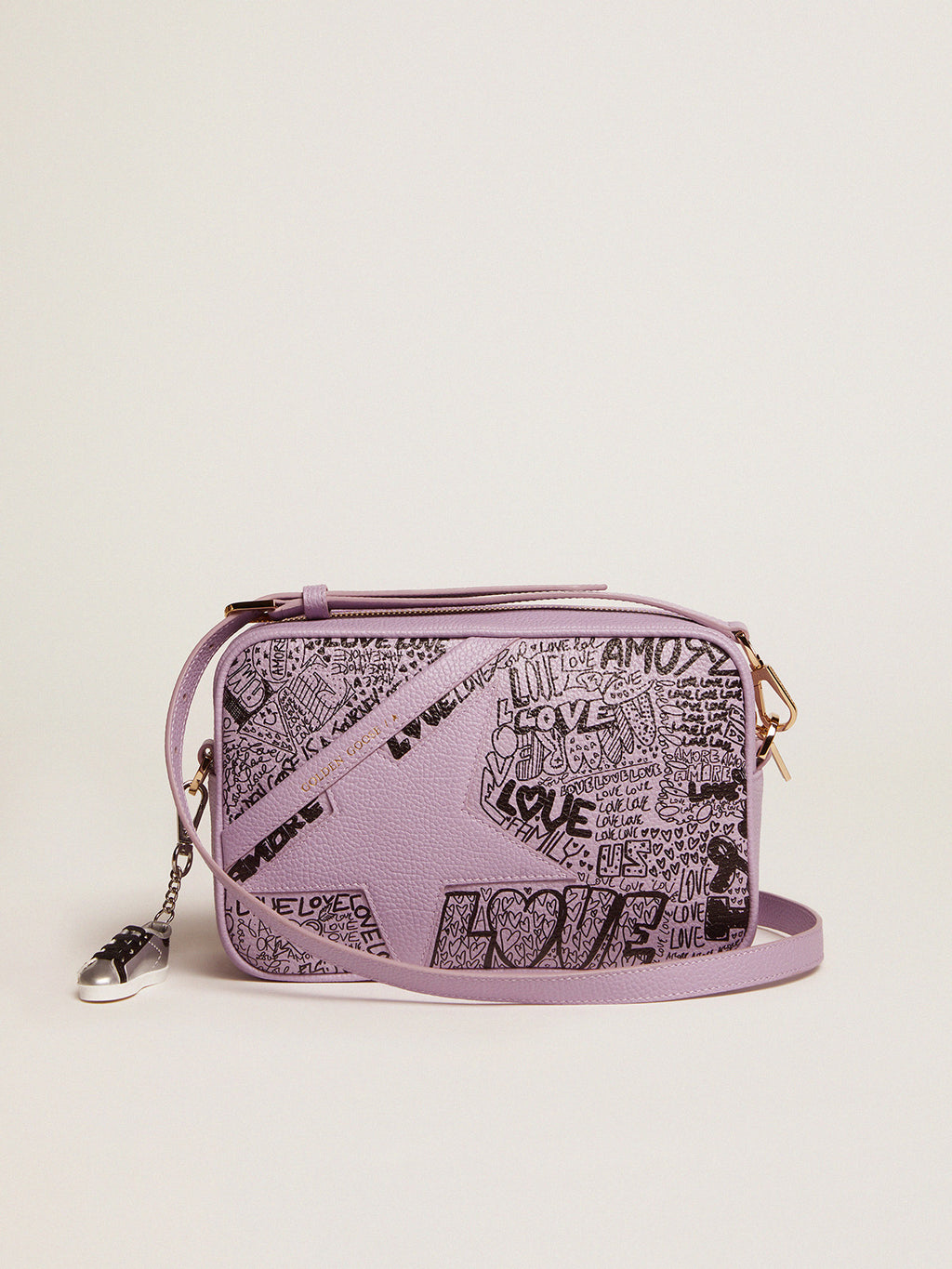 Lilac hammered leather Star Bag with tone-on-tone leather star and black all-over graffiti print| Golden Goose