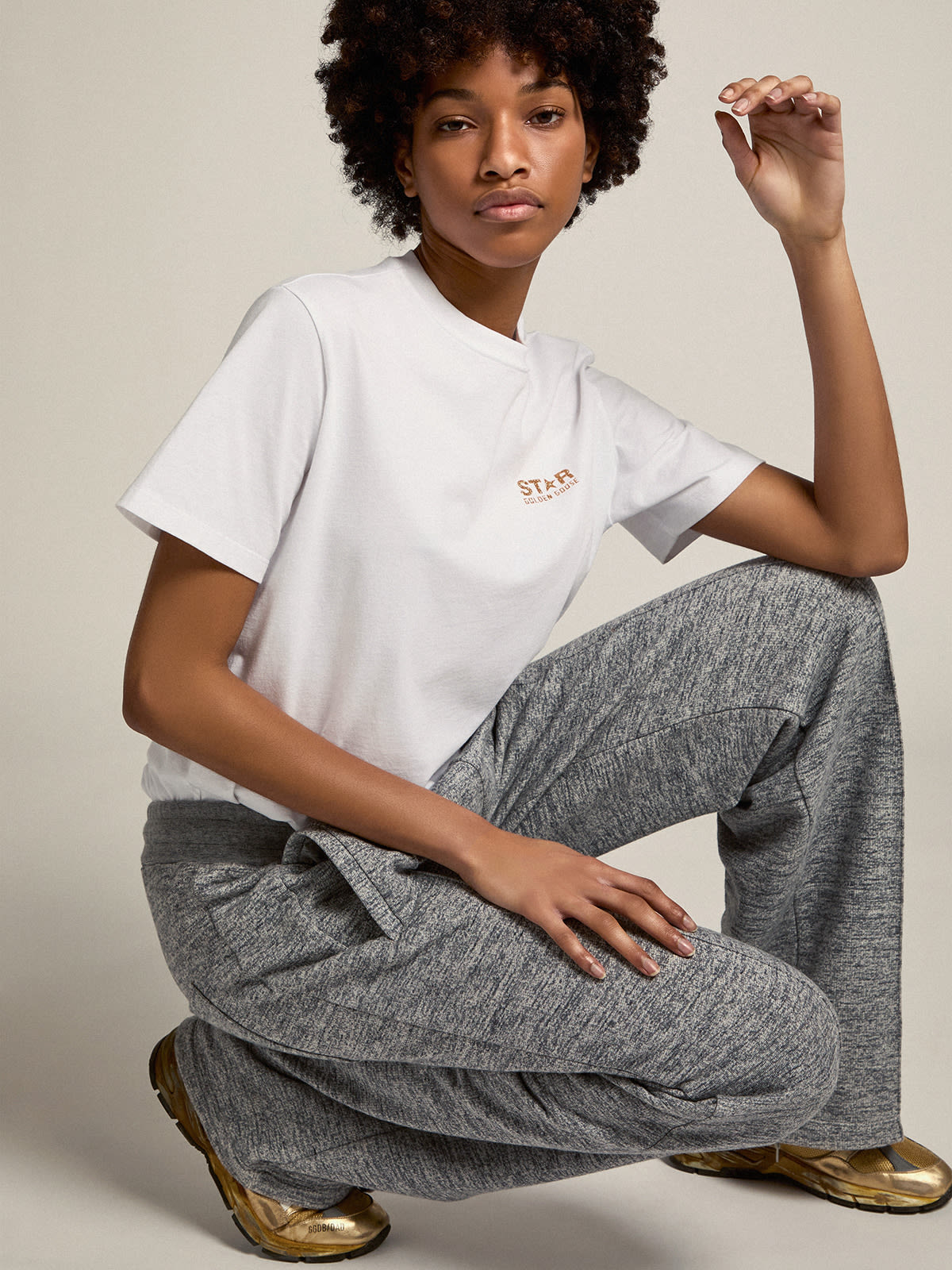 Women's white T-shirt with gold glitter logo and star| Golden Goose