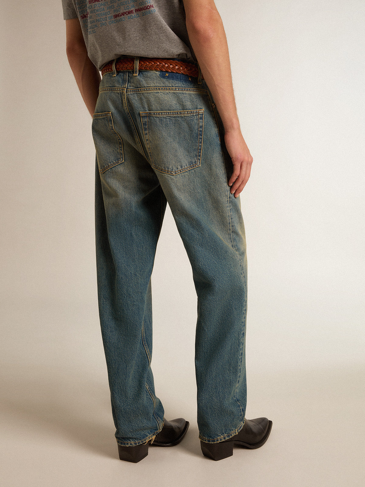 Blue jeans with a lived-in treatment| Golden Goose