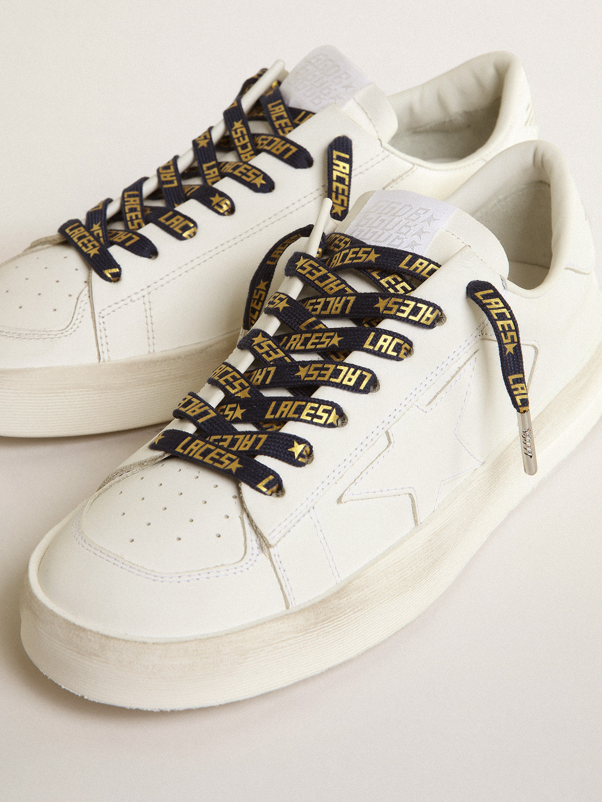 Navy-blue laces with contrasting gold-colored 'Laces' lettering| Golden Goose