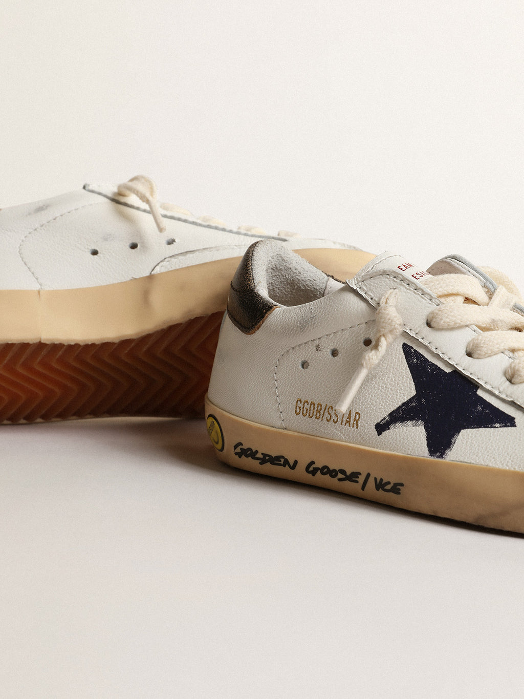 Super-Star Junior in nappa with a printed star and black heel tab| Golden Goose