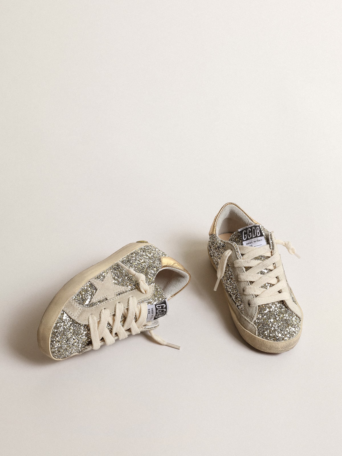 Super-Star Young in glitter with a suede star and gold heel tab| Golden Goose