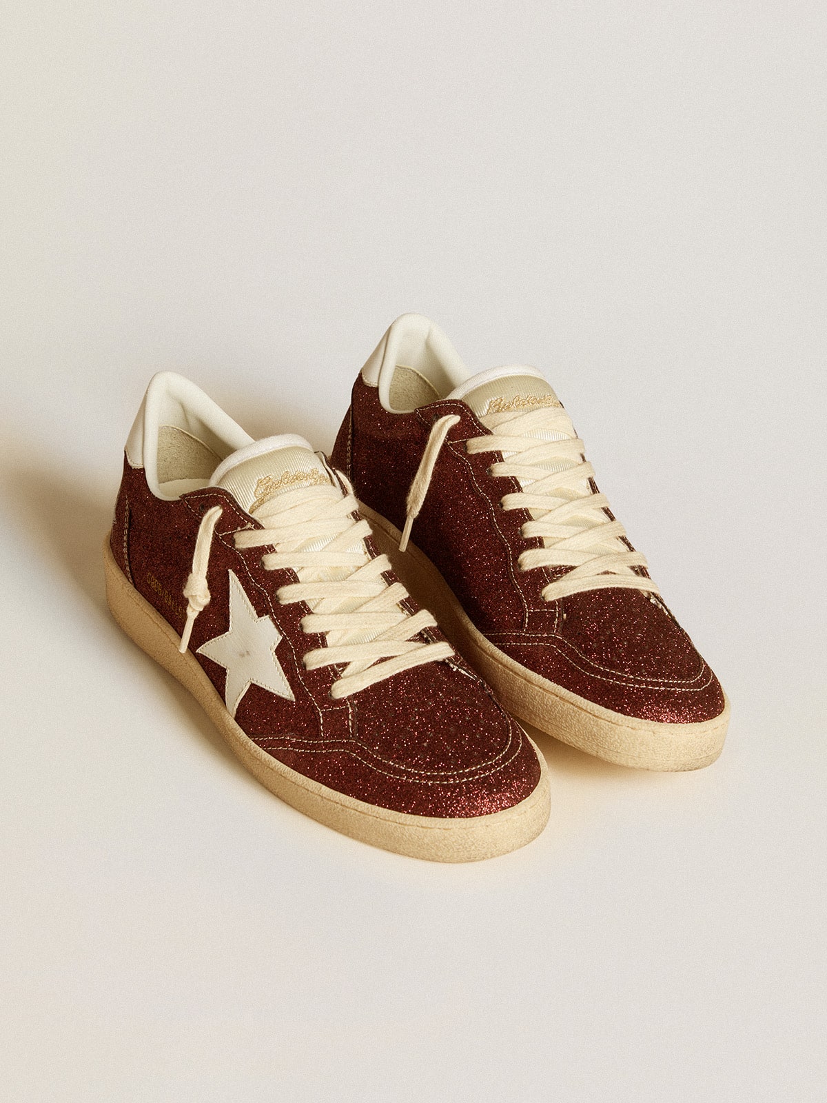 Ball Star in burgundy glitter with white leather star and heel tab| Golden Goose