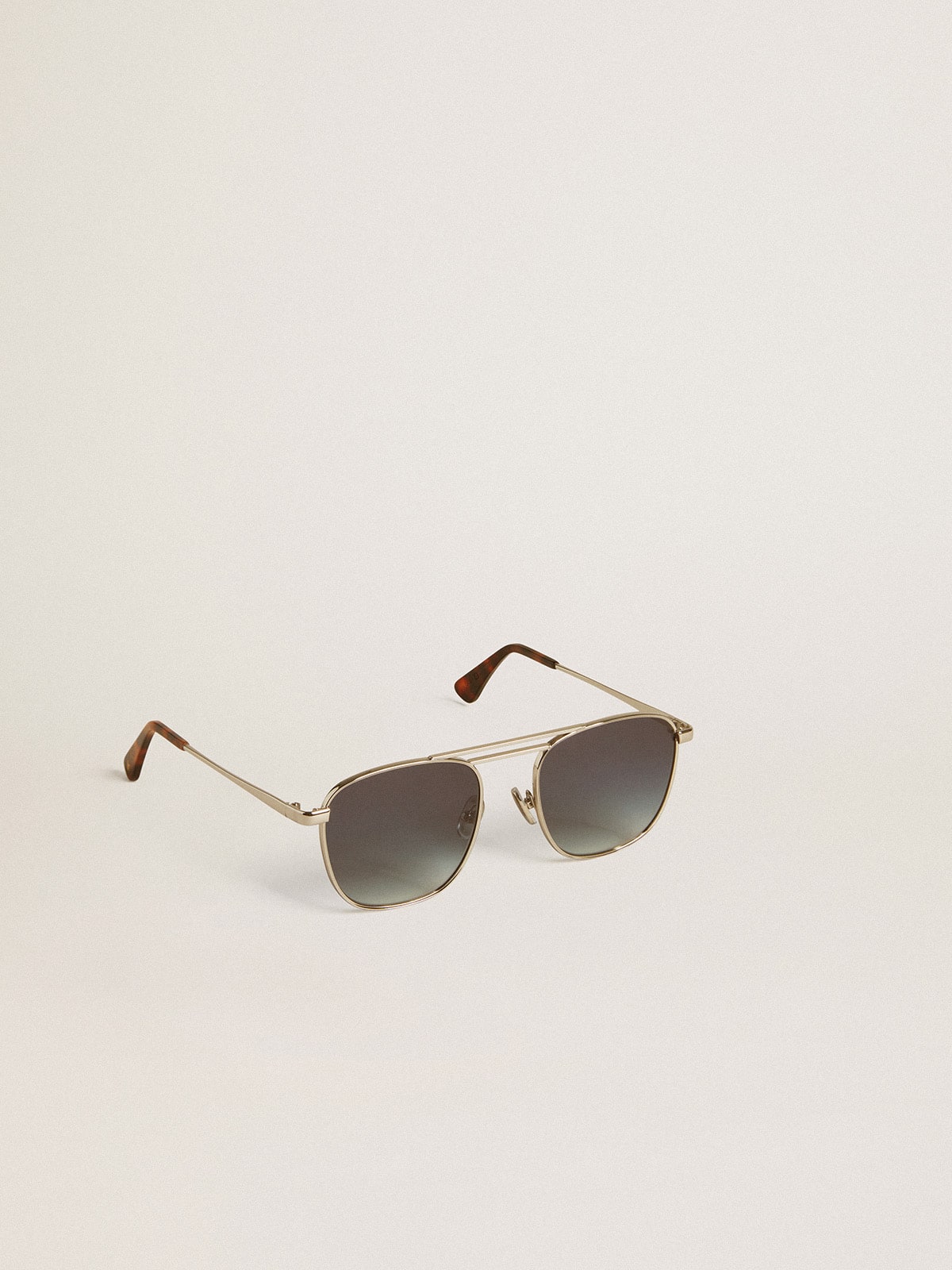 Aviator style sunglasses with silver frame and blue lenses| Golden Goose
