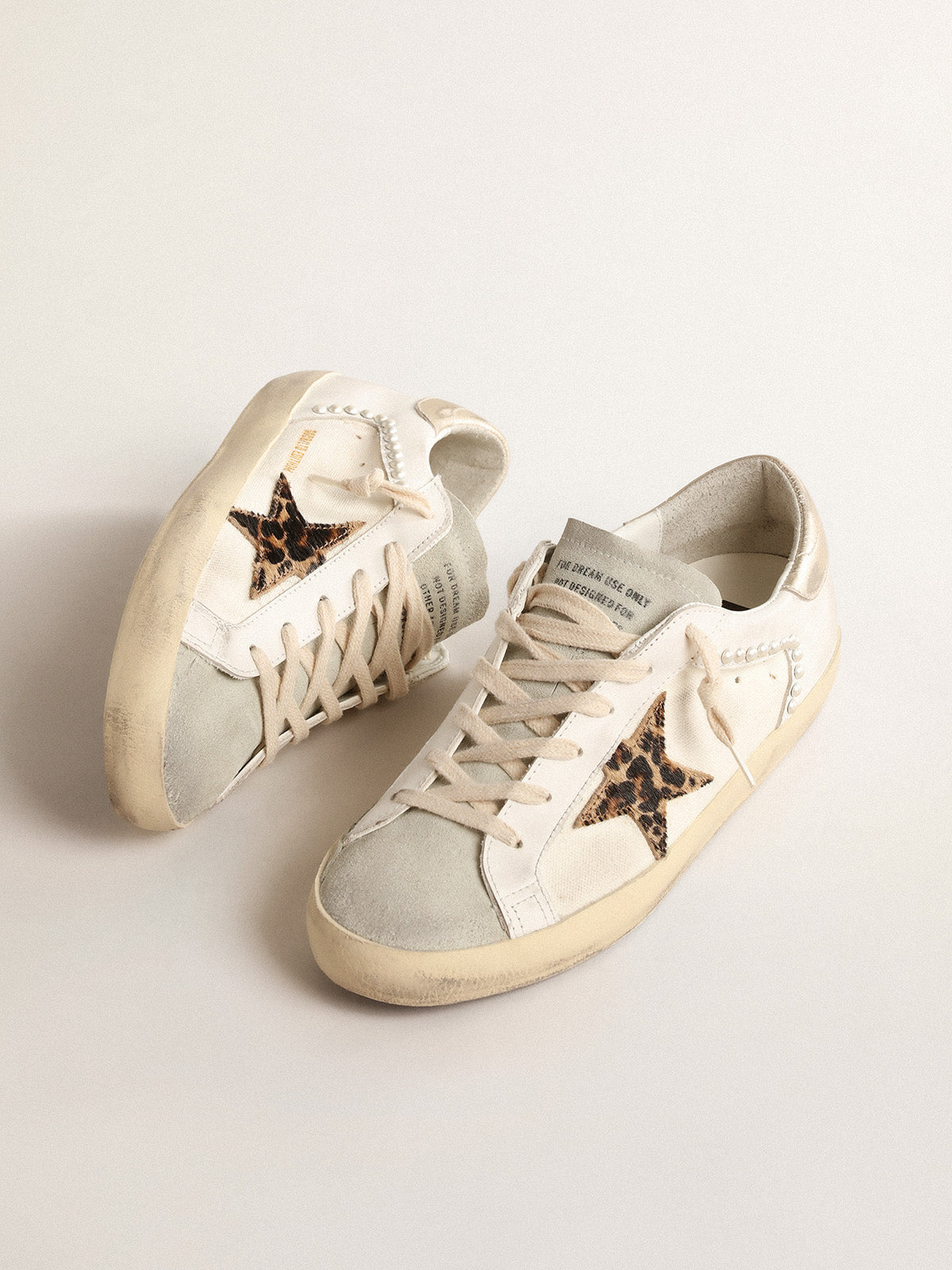 Super-Star LTD in canvas and leather with leopard-print pony skin star| Golden Goose