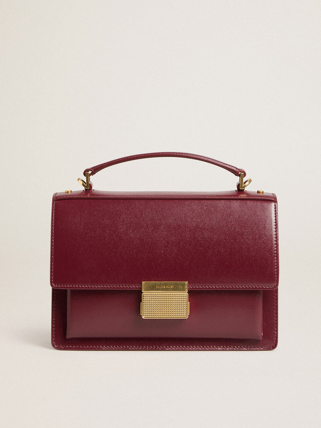 Venezia Bag in burgundy boarded leather with gold details| Golden Goose