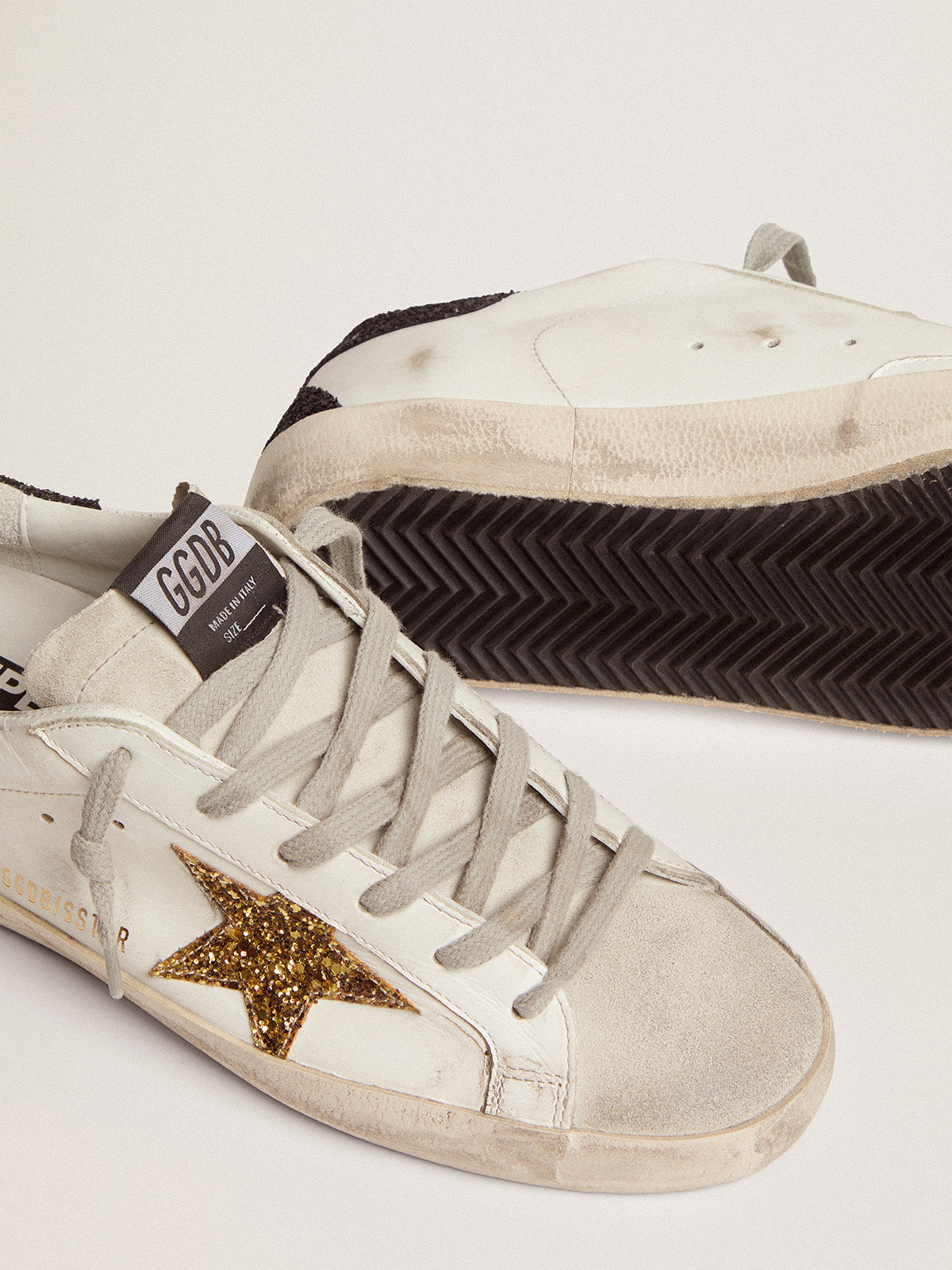 Women's Super-Star with gold star and black glitter heel tab| Golden Goose