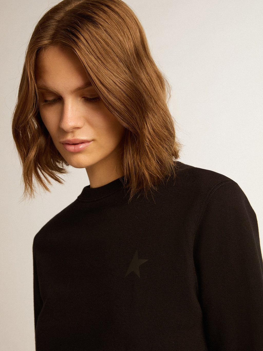 Black Athena Star Collection sweatshirt with tone-on-tone star on the front| Golden Goose
