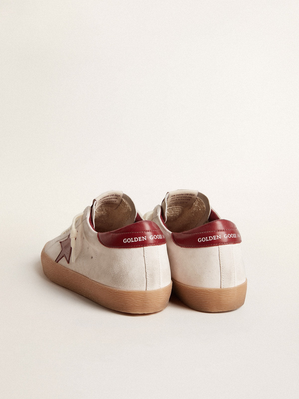 Super-Star in white suede with burgundy leather star and heel tab| Golden Goose
