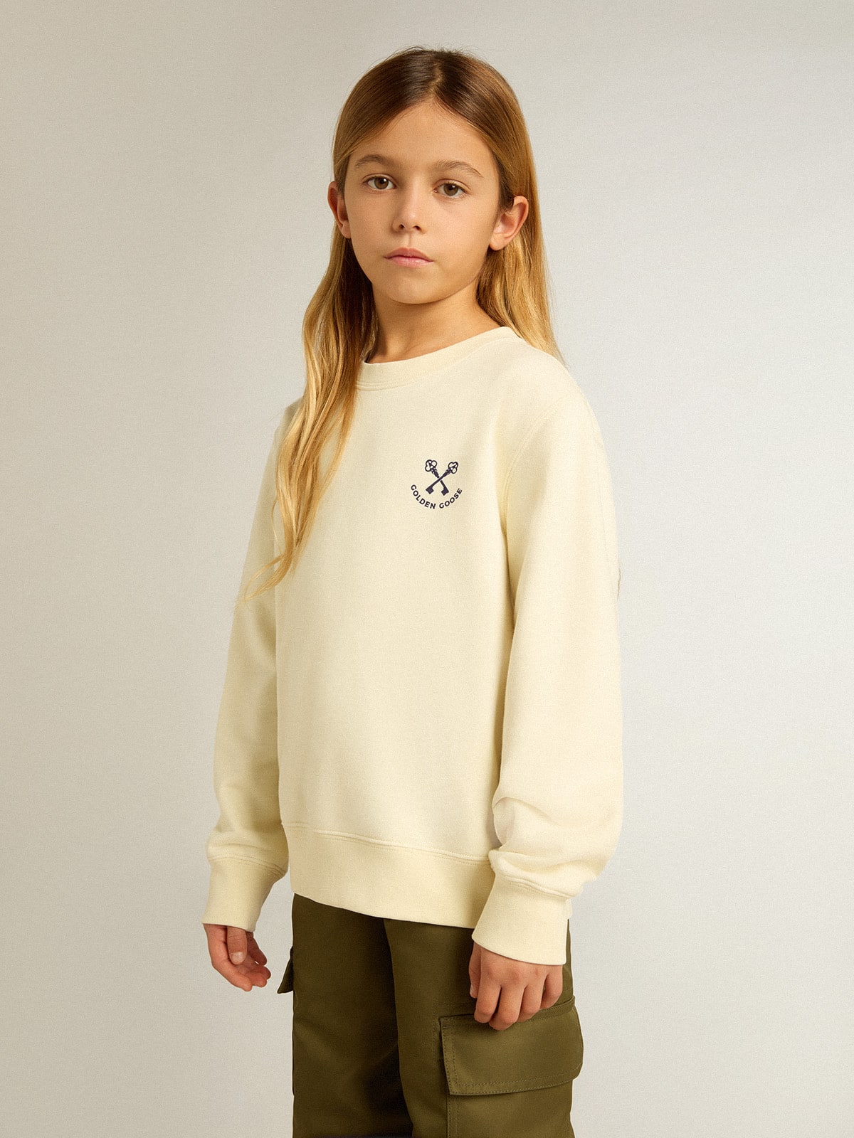 Girls' T-shirt in worn white with embroidery on the front and print on the back| Golden Goose