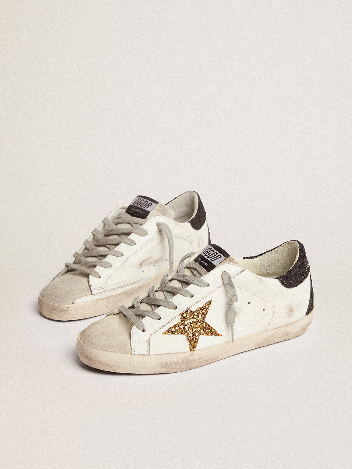 Women's Super-Star with gold star and black glitter heel tab| Golden Goose