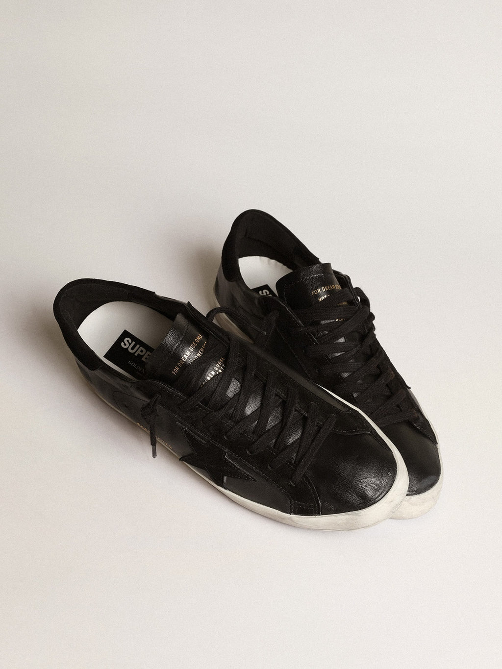 Men's Super-Star in black nappa with black suede star and heel tab| Golden Goose