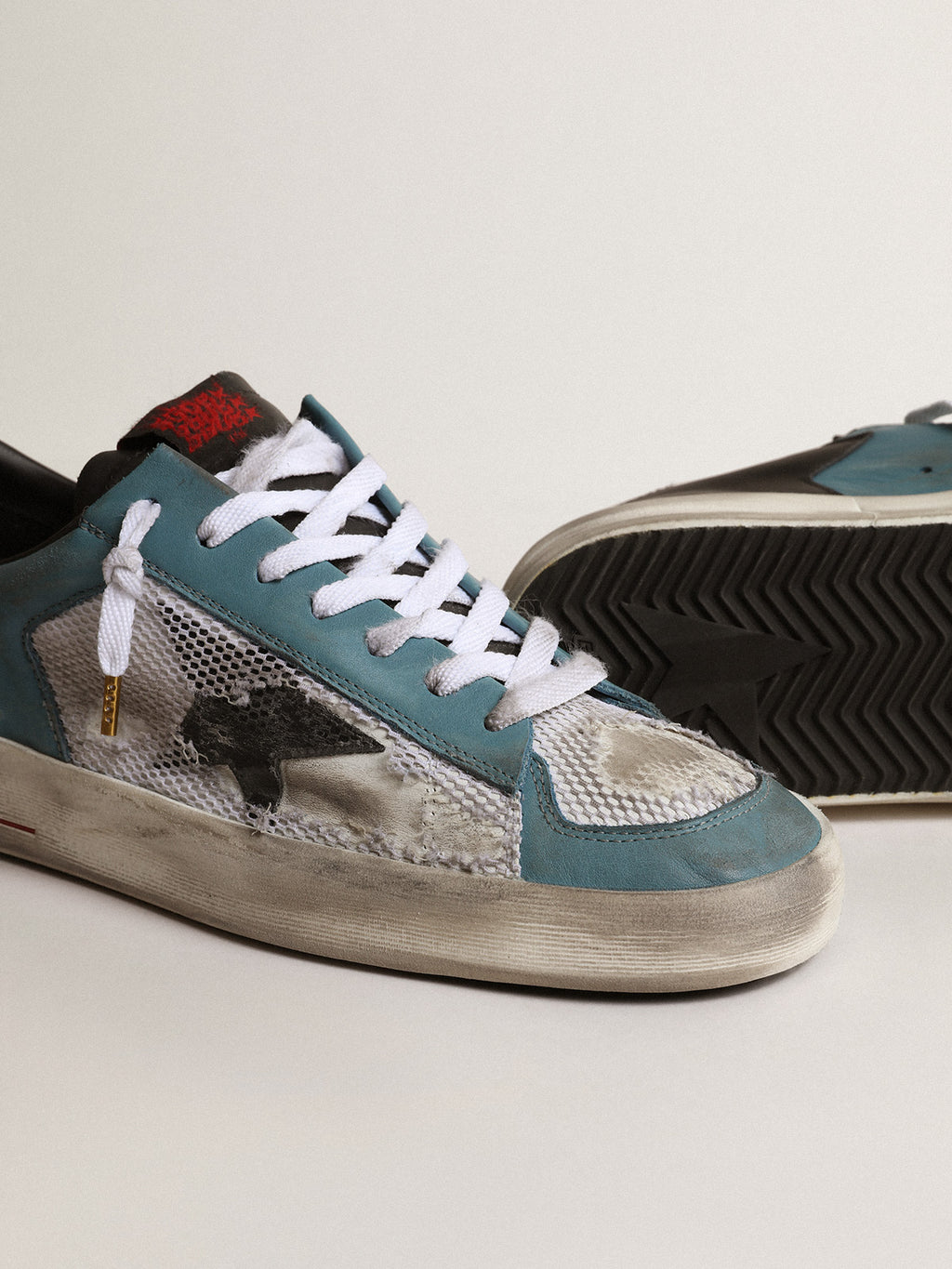 Men's Stardan in distressed mesh and petrol-colored upper| Golden Goose