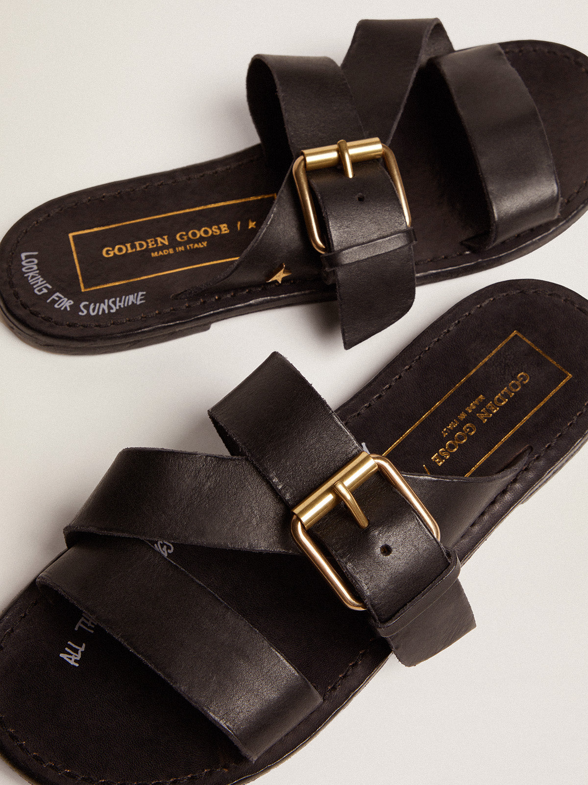 Black leather flat sandals with buckle Margaret| Golden Goose