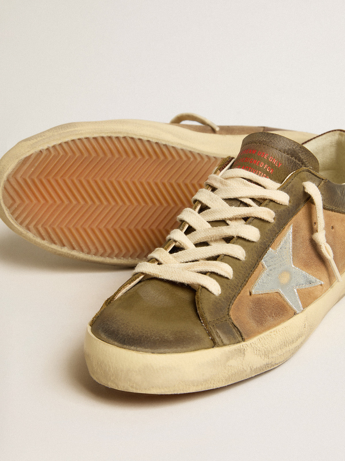Super-Star LTD in green leather and tobacco-colored suede with silver star| Golden Goose