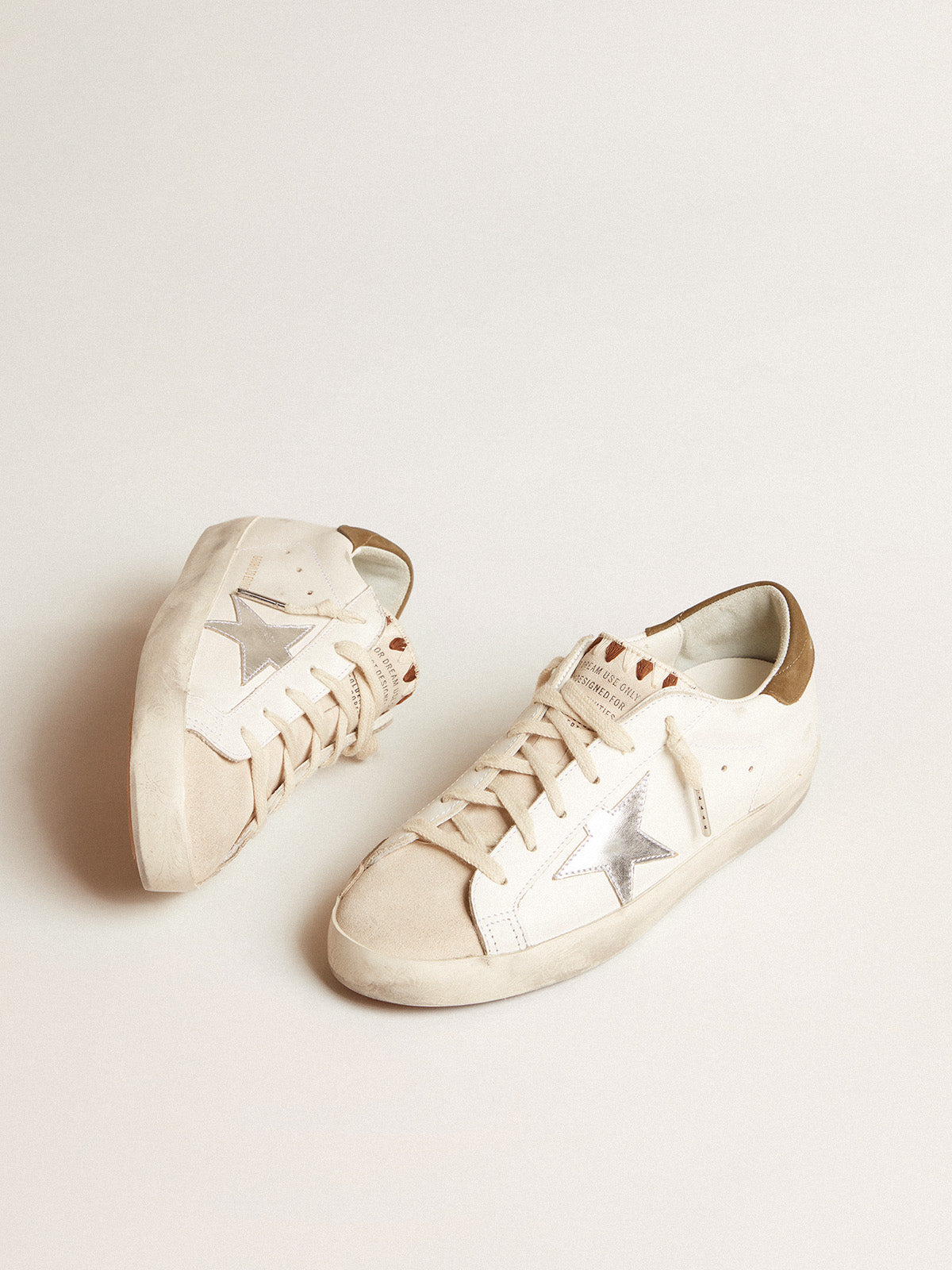 Super-Star LTD with metallic silver leather star and brown heel tab| Golden Goose