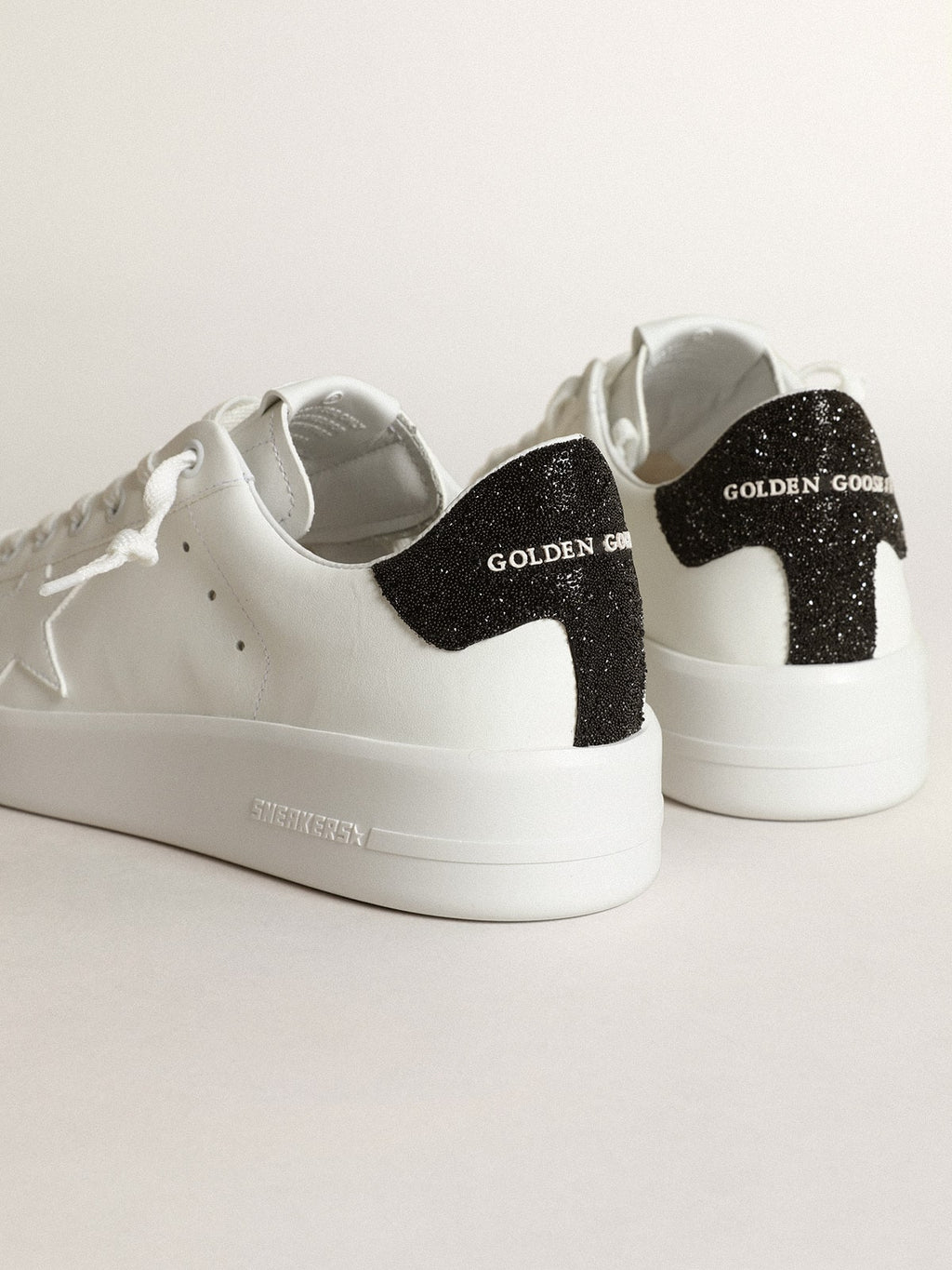 Purestar in white leather with tone-on-tone star and heel tab in black Swarovski crystals| Golden Goose