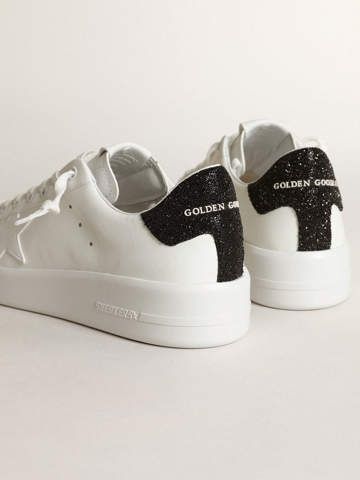 Purestar in white leather with tone-on-tone star and heel tab in black Swarovski crystals| Golden Goose