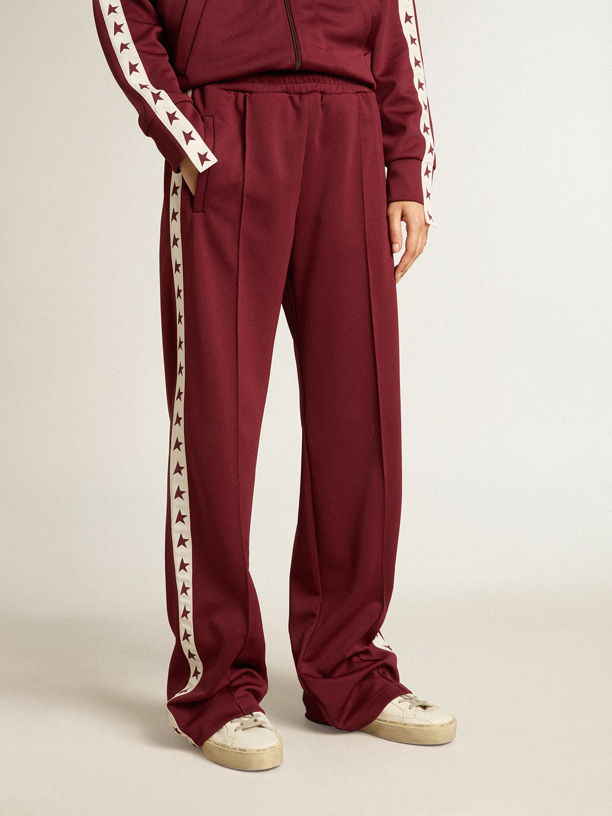 Women's burgundy joggers with stars on the sides| Golden Goose