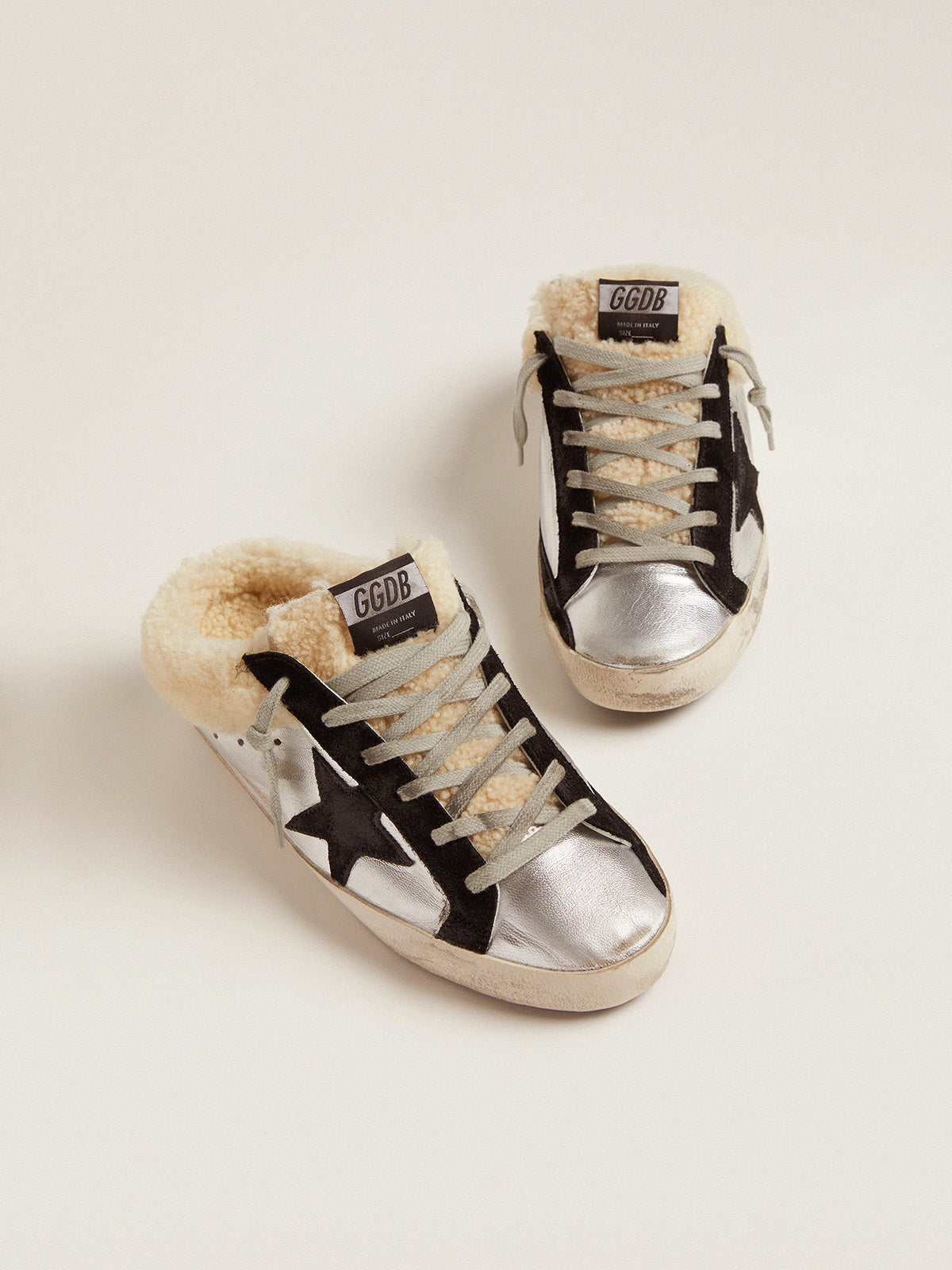 Women's Super-Star Sabot in silver laminated leather with black star| Golden Goose