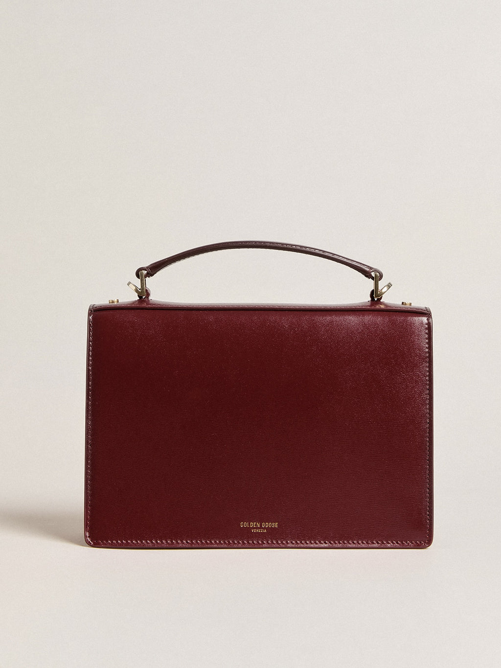 Venezia Bag in burgundy boarded leather with gold details| Golden Goose
