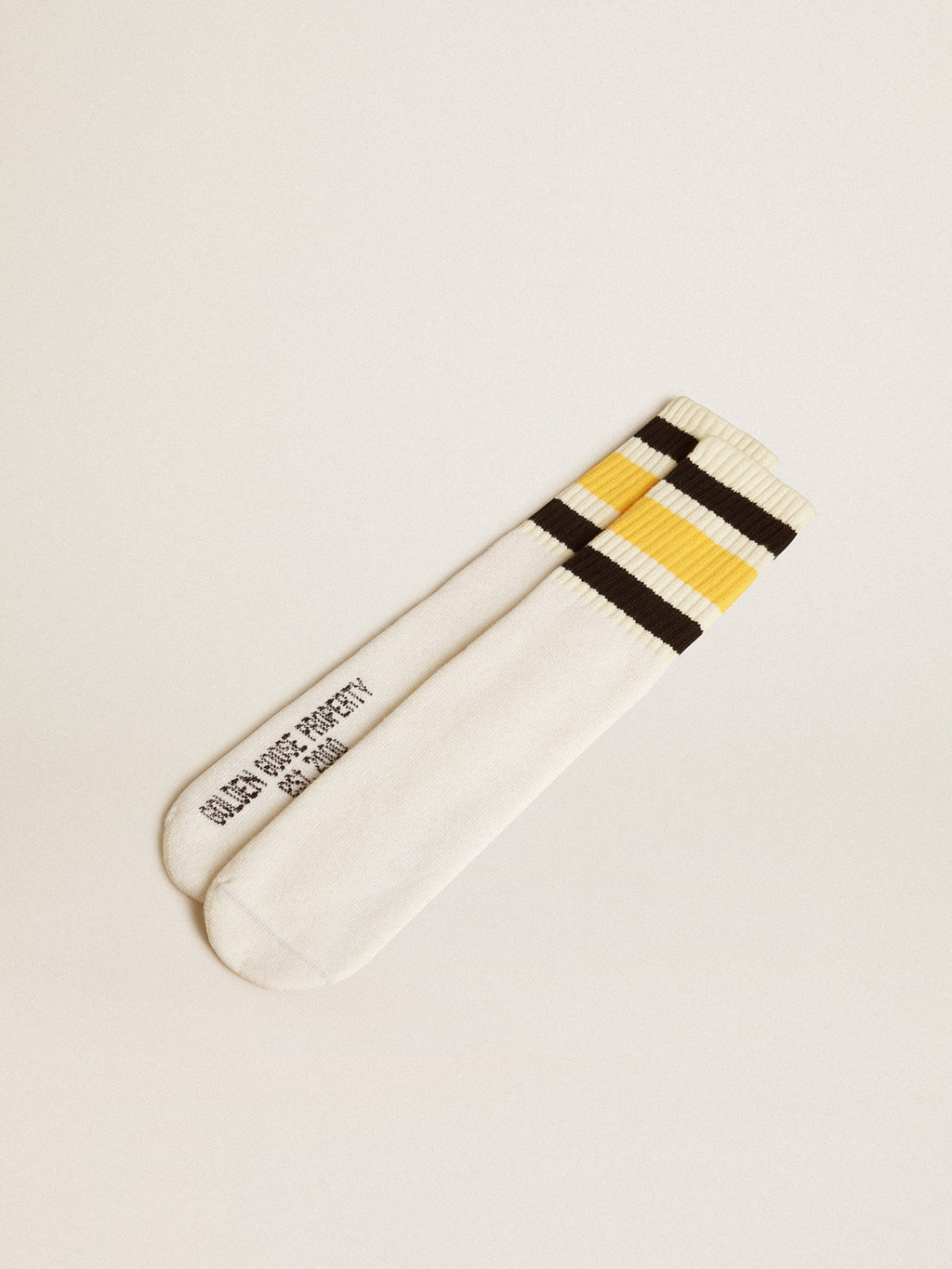Worn-white socks with distressed details and black and yellow stripes| Golden Goose